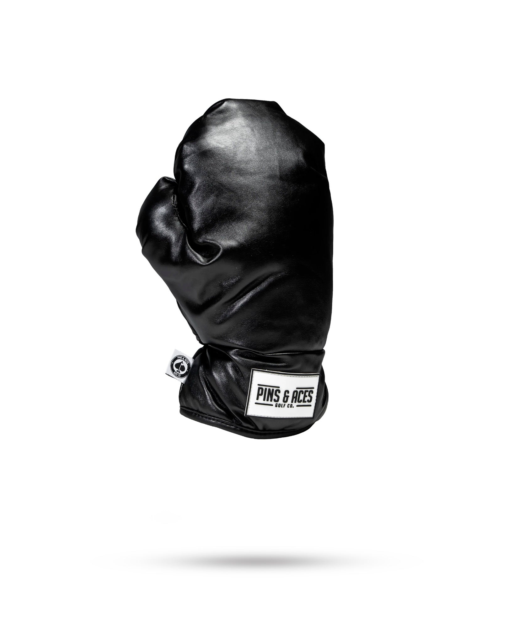 Black boxing glove fairway cover for golf clubs.