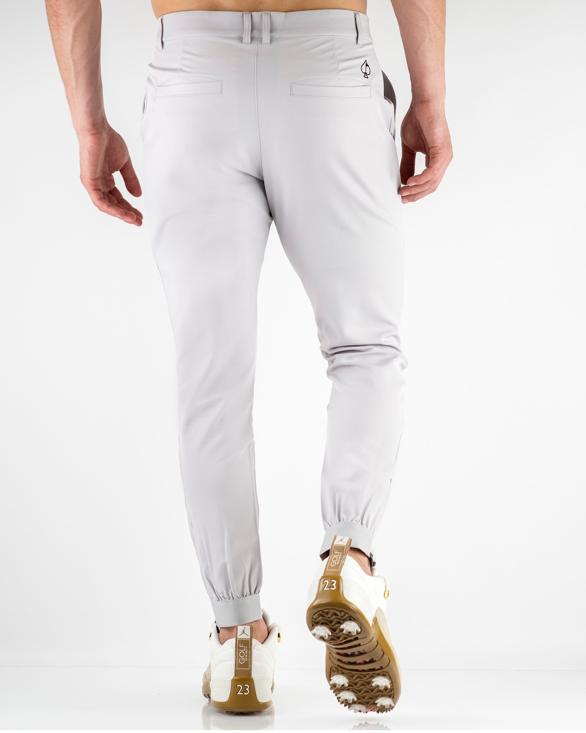 Performance jogger in stone color, featuring a comfortable fit and elastic waistband.