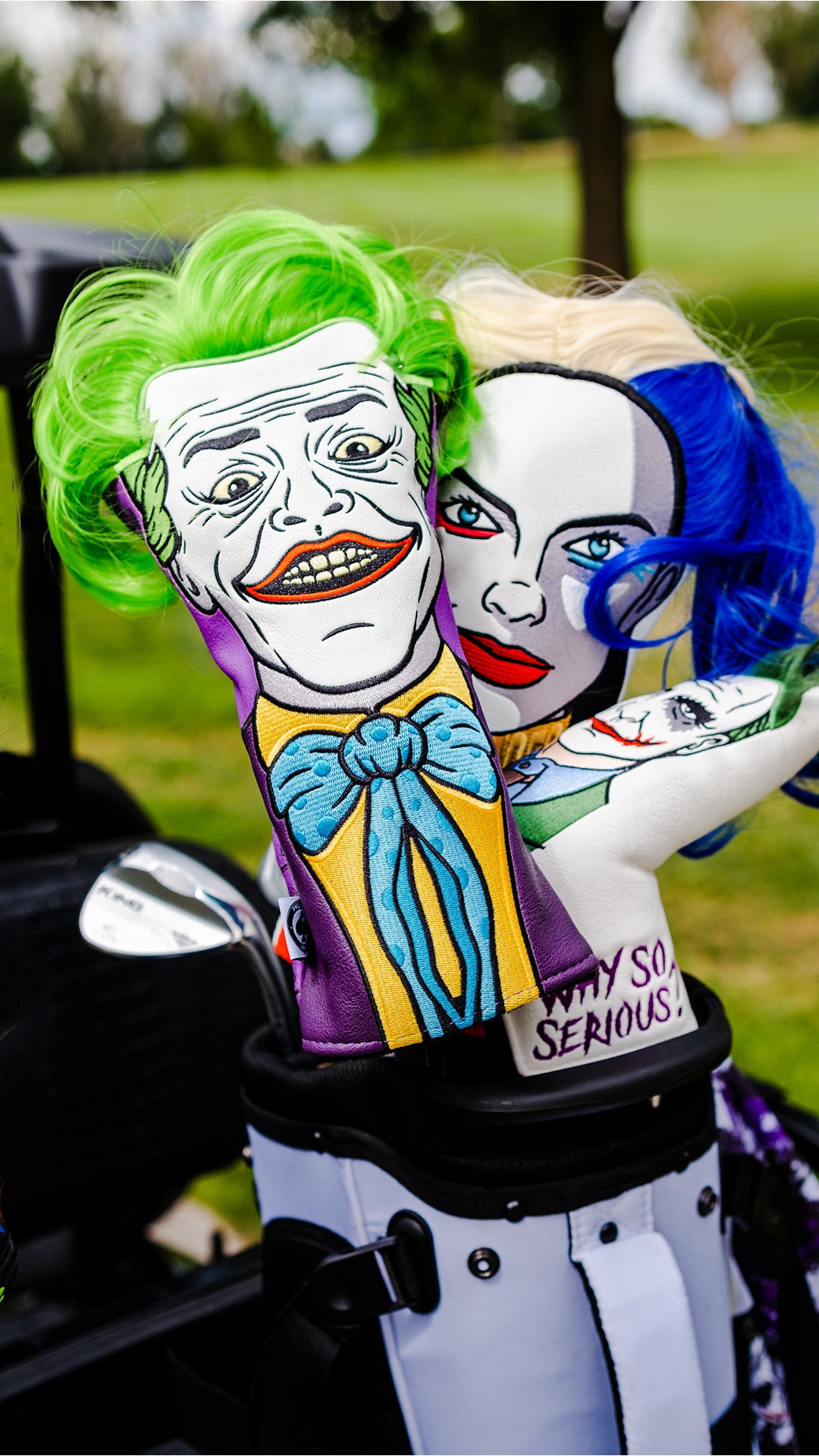 Alt text: The Quinn driver cover featuring a joker design, displayed in a golf bag alongside a Harley Davidson logo.