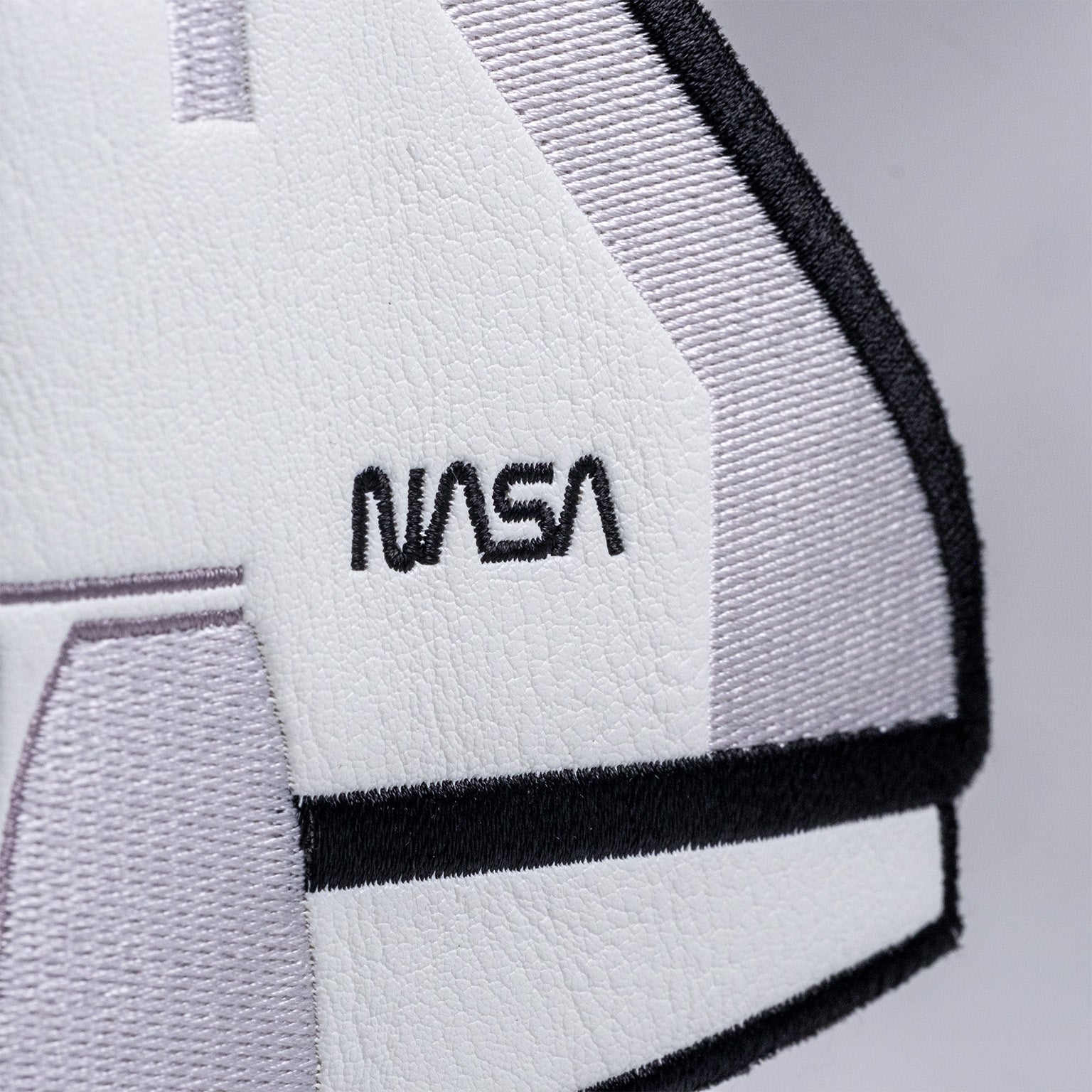 NASA Space Shuttle driver cover featuring a detailed embroidered design and vibrant colors, perfect for car enthusiasts and space fans.