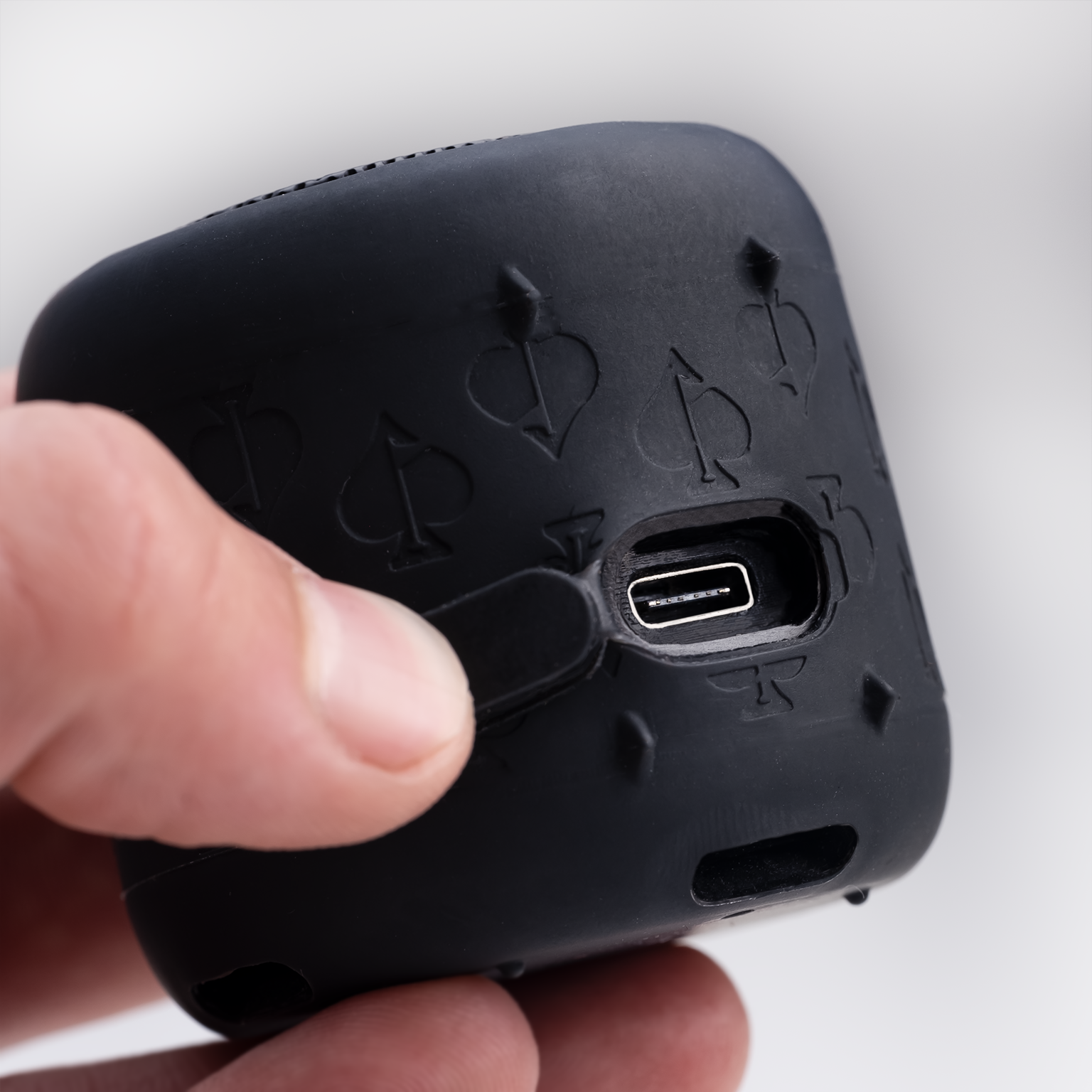 Alt text: "The Spade Speaker showcasing USB connection detail on a sleek black design."