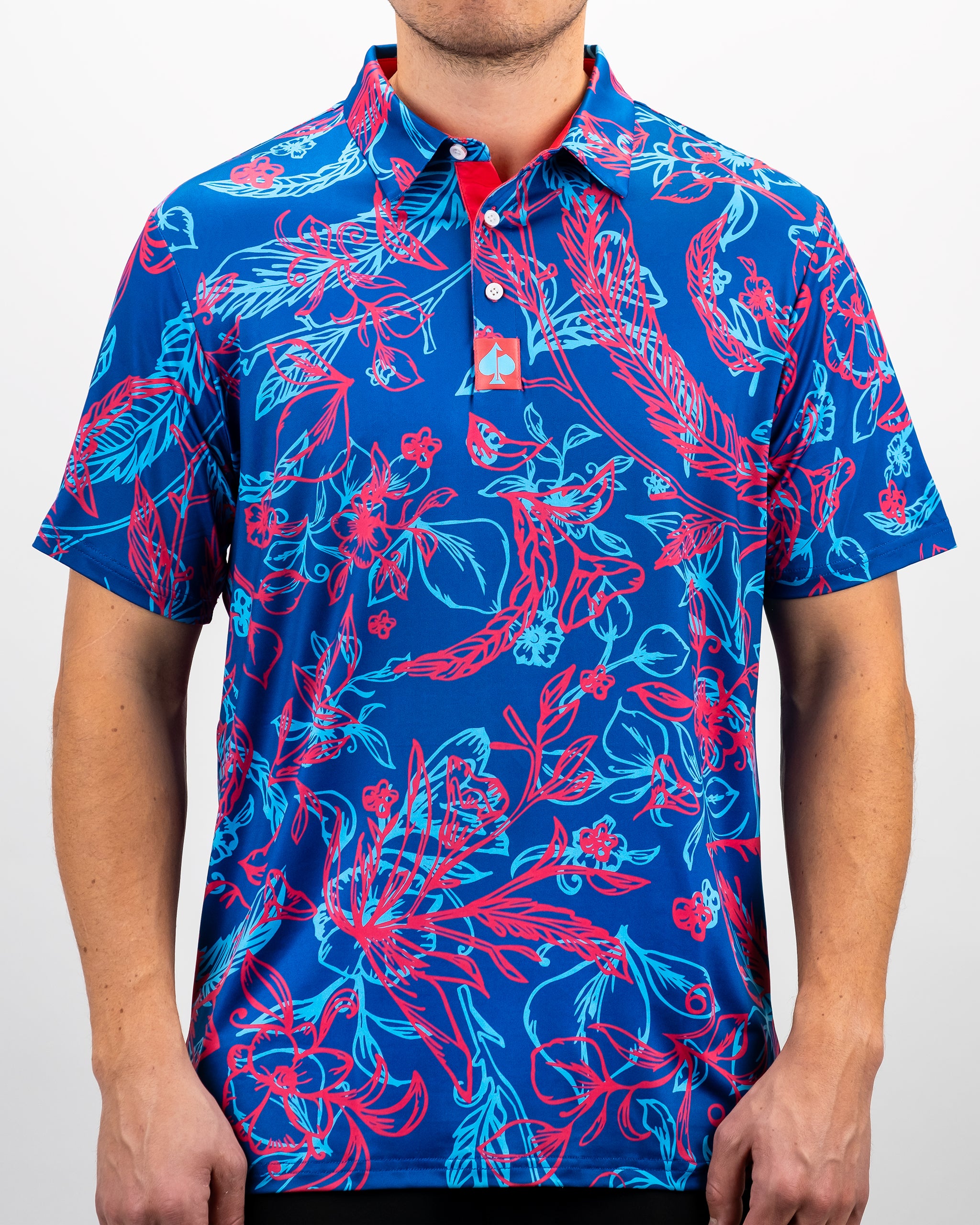 Cabo Colada men's polo shirt in vibrant turquoise with short sleeves, modeled outdoors.