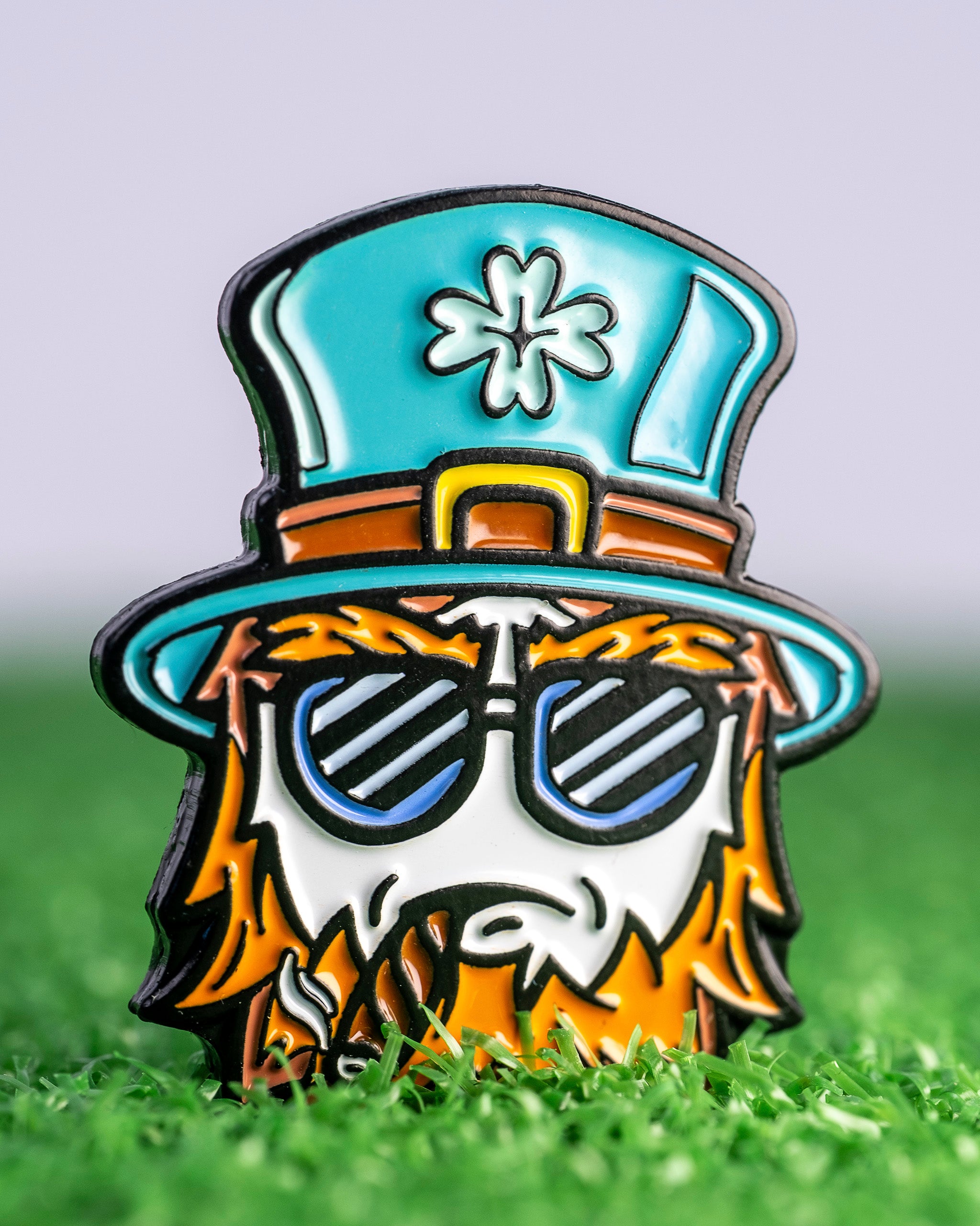 Seamus the Degenerate Ball Marker featuring a playful cartoon design with colorful accents, ideal for golf enthusiasts.