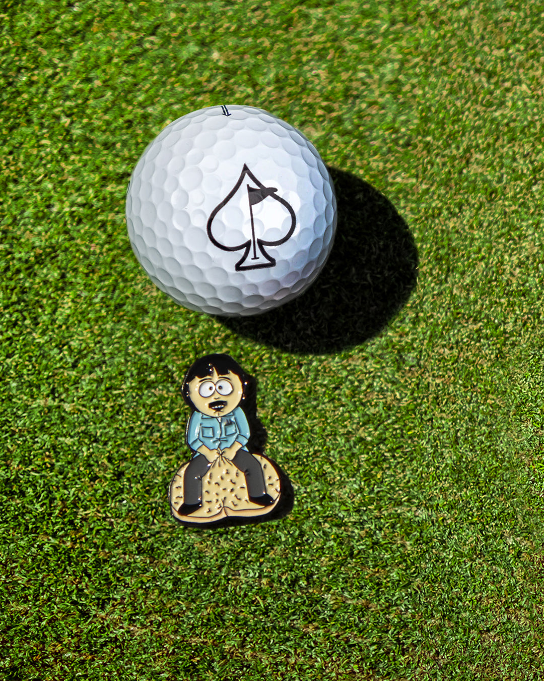 "South Park Randy ball marker featuring a colorful design, ideal for golf aficionados and fans of the show."