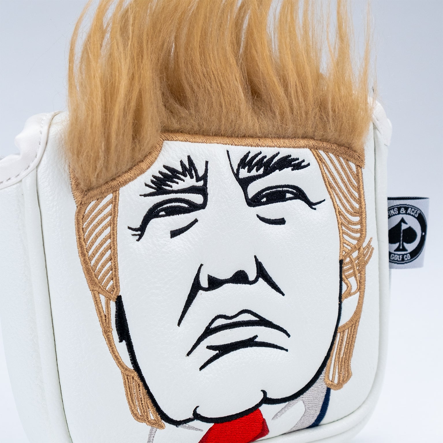Trump mallet putter cover featuring a sleek design, showcasing bold colors and stitching details, ideal for golfers seeking a stylish accessory.