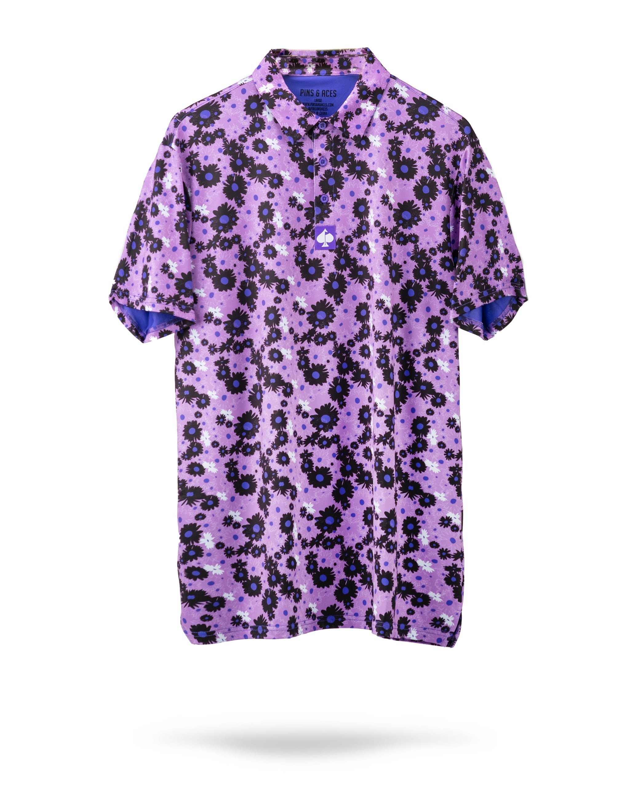 Bold purple golf shirt featuring a dark daisy floral pattern, designed for golfers who want to stand out on the course.
