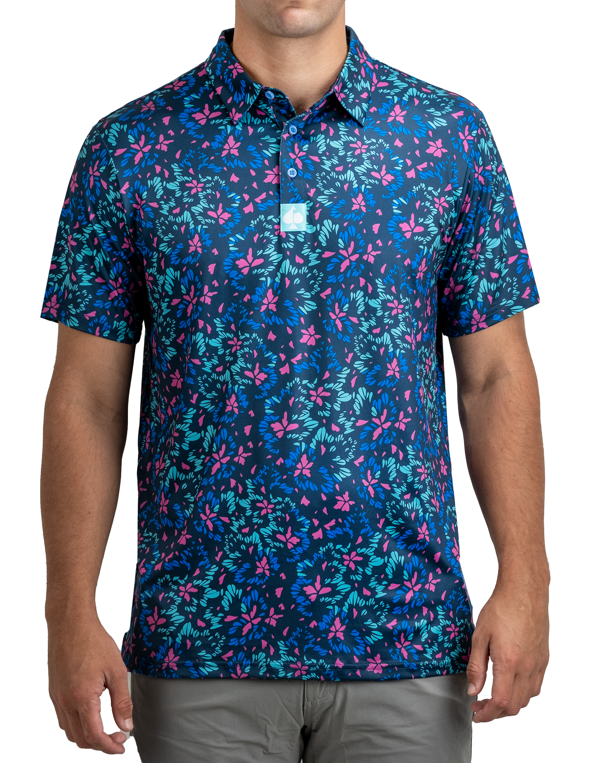 Men's golf shirt featuring a vibrant fluorescent floral pattern on a dark blue background, perfect for stylish play on the course.