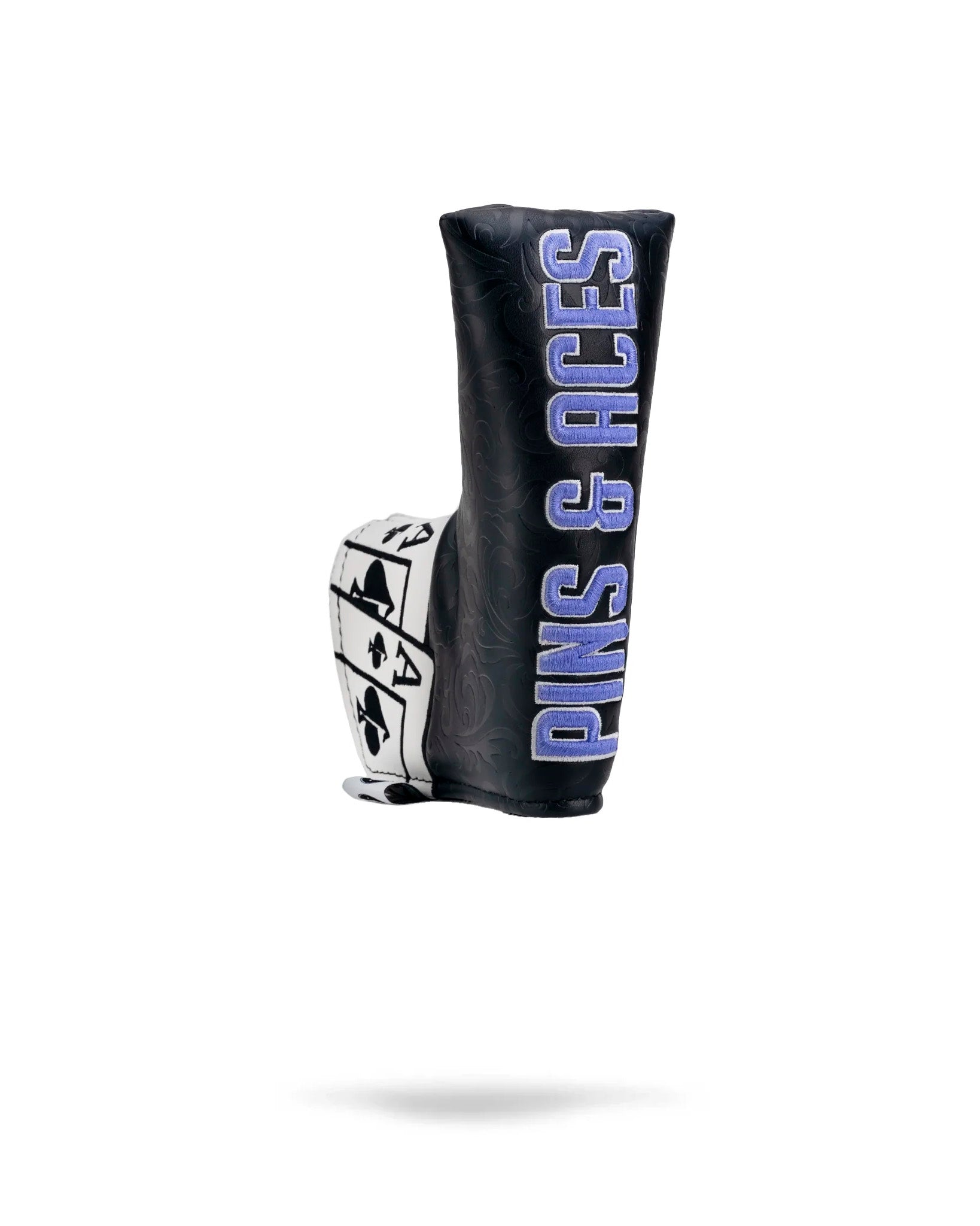 Bold black and white blade putter cover featuring the Ace of Spades design and "Pins & Aces" branding for stylish protection.
