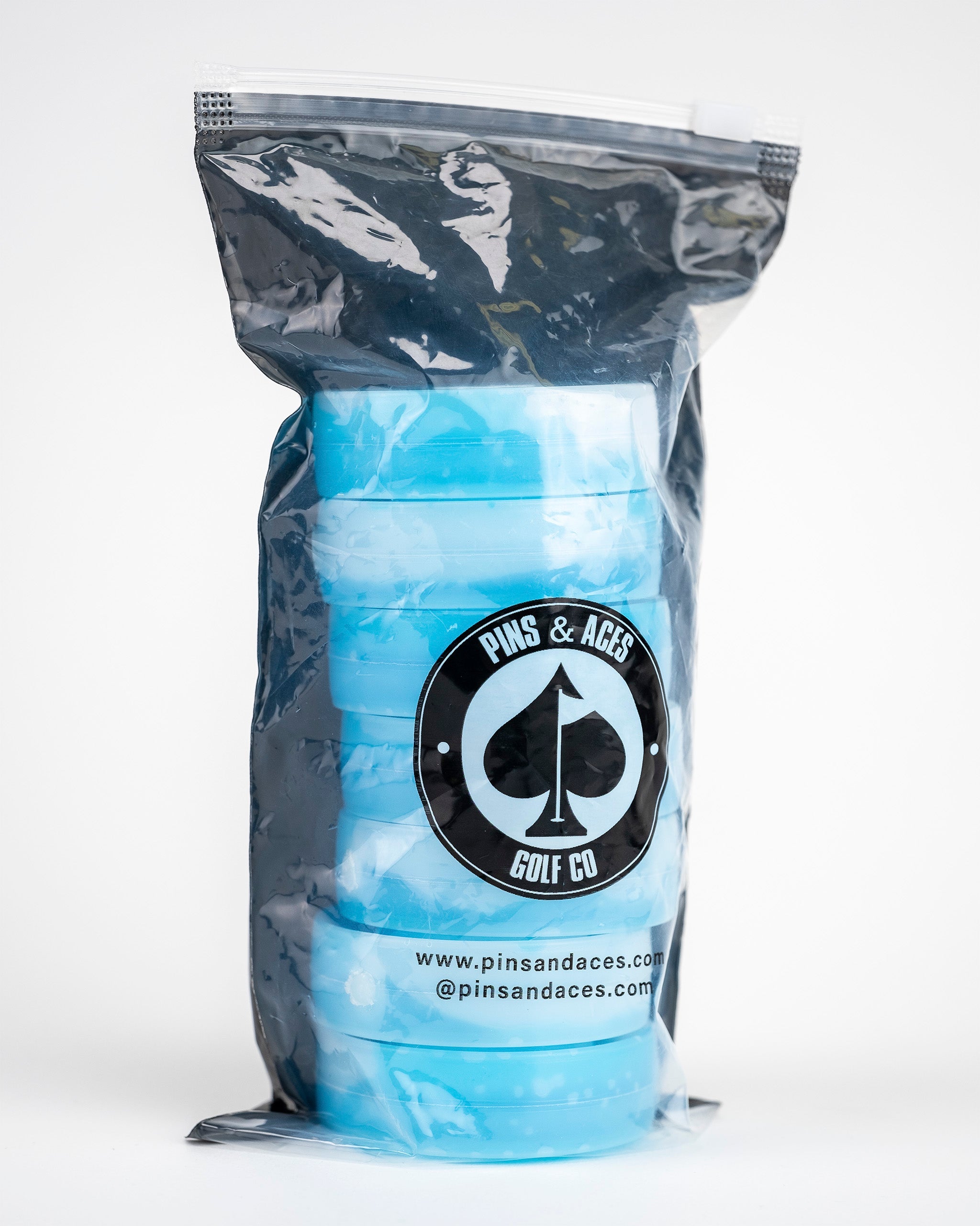 Blue Beer Sleeve Ice Pucks packaged in a clear bag, designed to keep beverages cold on the golf course.