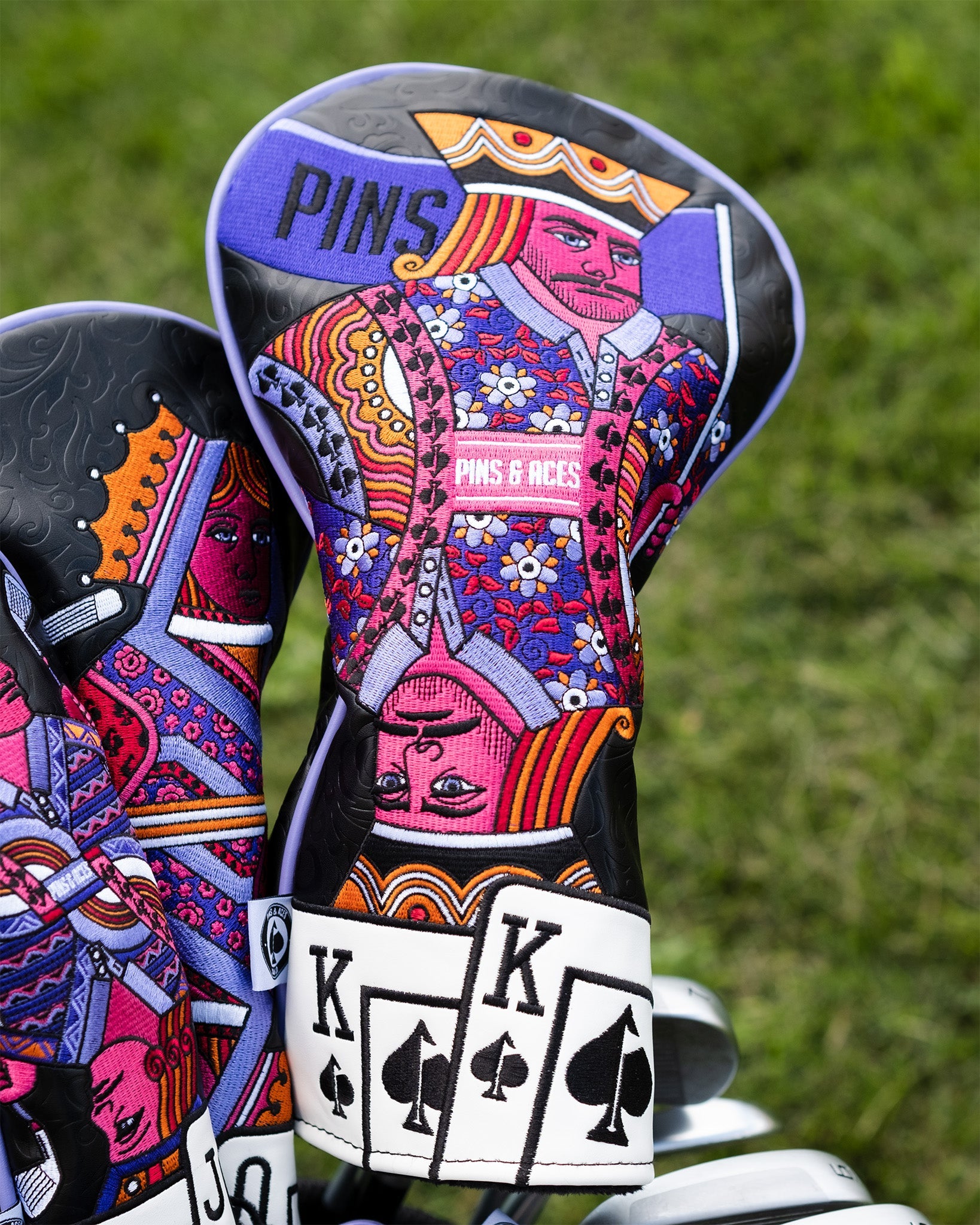 Bold King of Spades driver cover featuring vibrant colors and intricate designs, perfect for stylish golfers.
