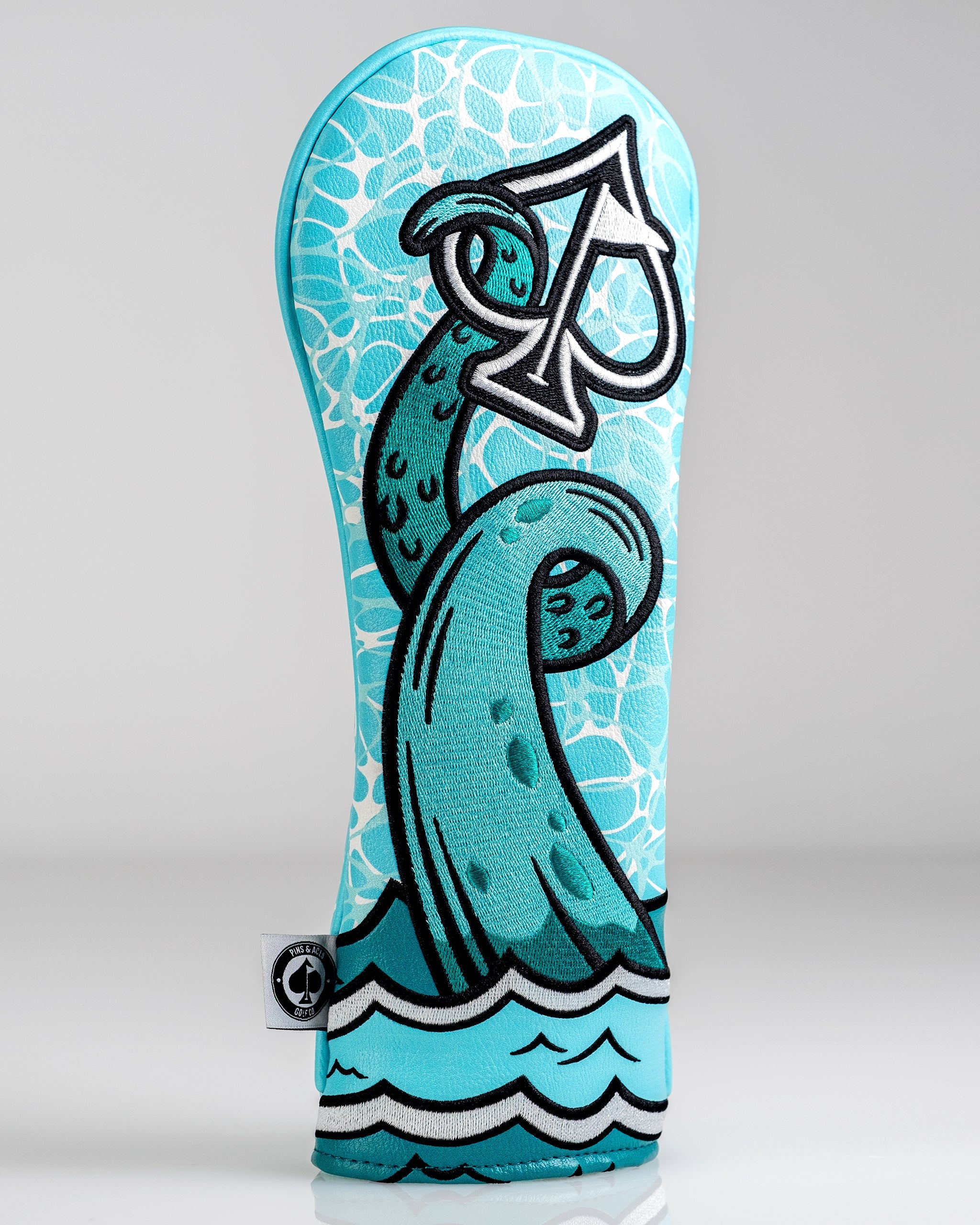 Bold Kraken fairway cover featuring a vibrant octopus design in turquoise and black, perfect for stylish golfers.