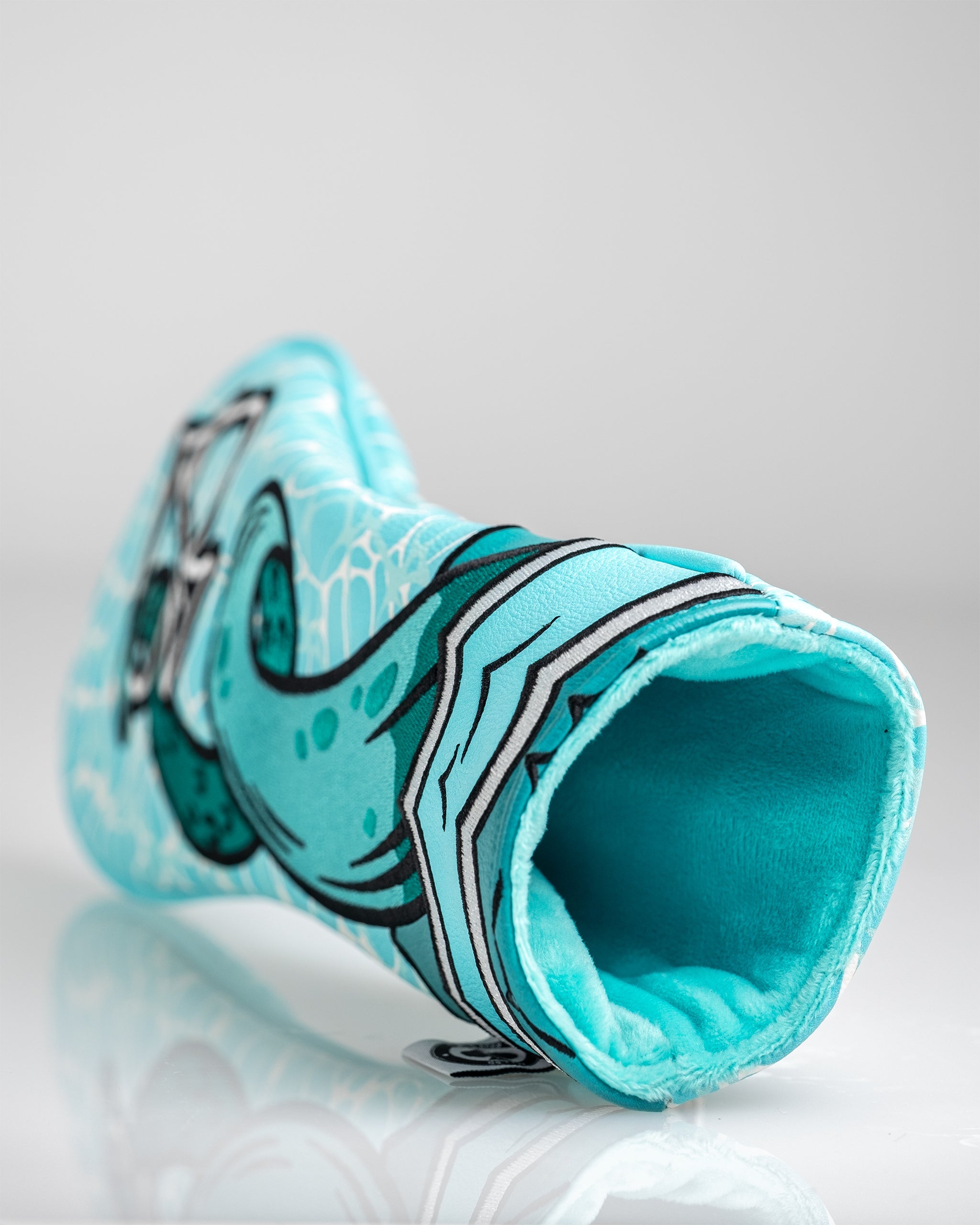 Kraken fairway cover featuring a vibrant turquoise design with a playful sea creature motif, perfect for golfers.