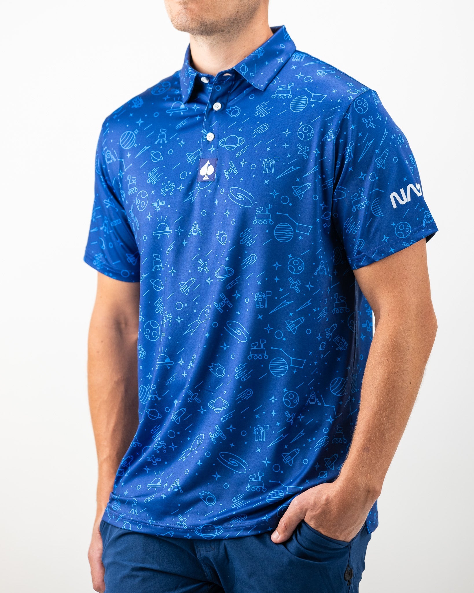 Bold blue NASA polo featuring a unique space-themed graphic design, perfect for golf enthusiasts and space lovers.