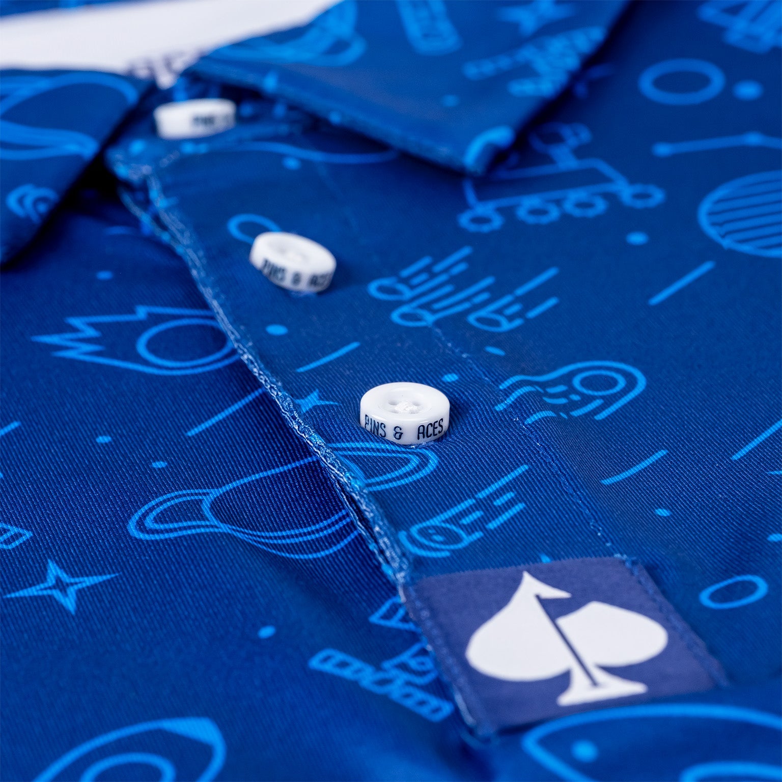 Bold blue NASA polo featuring playful space-themed graphics and a classic button-up design, perfect for stylish golfers.