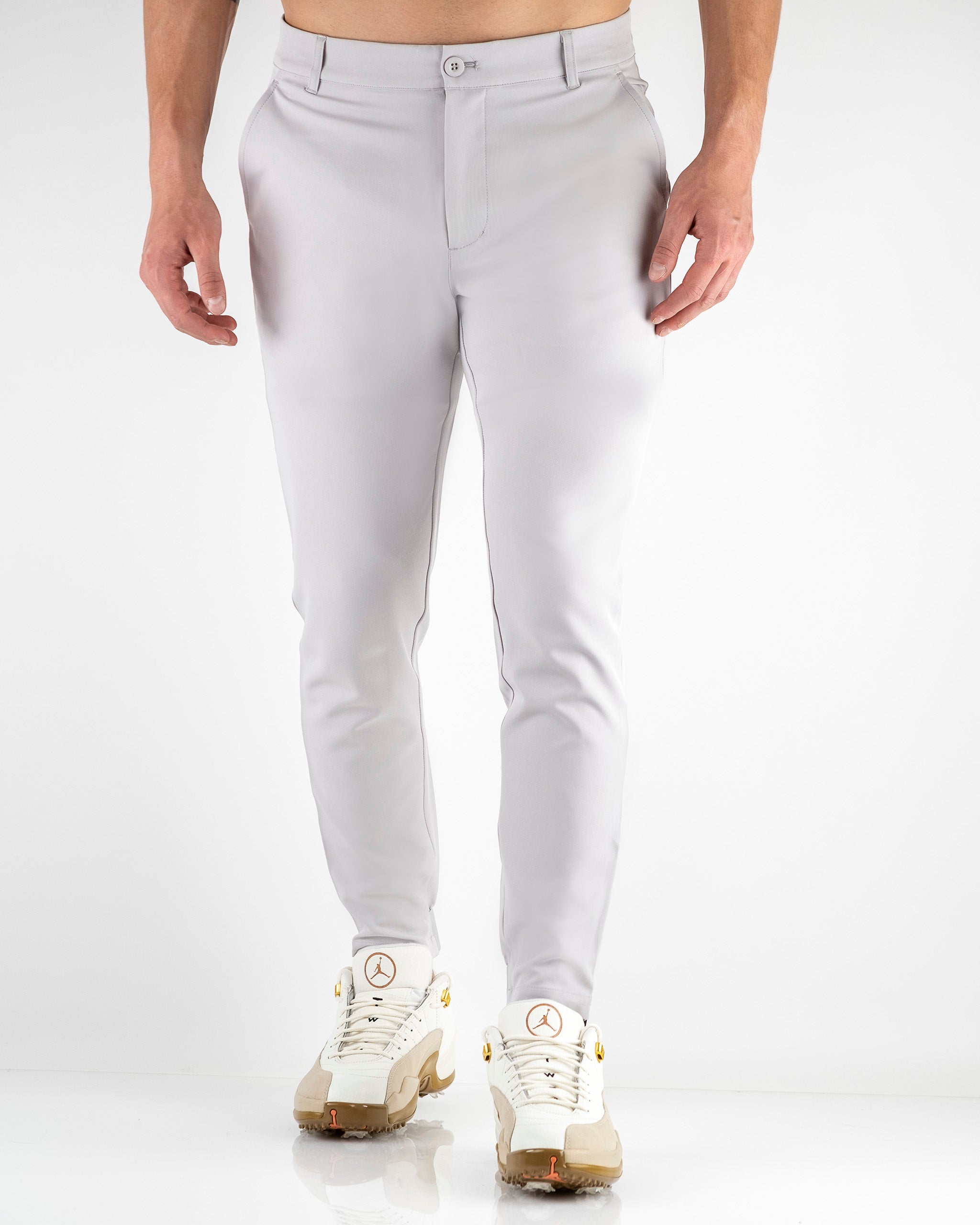 Men's stone performance jogger featuring a sleek fit and lightweight fabric, ideal for stylish comfort on and off the golf course.