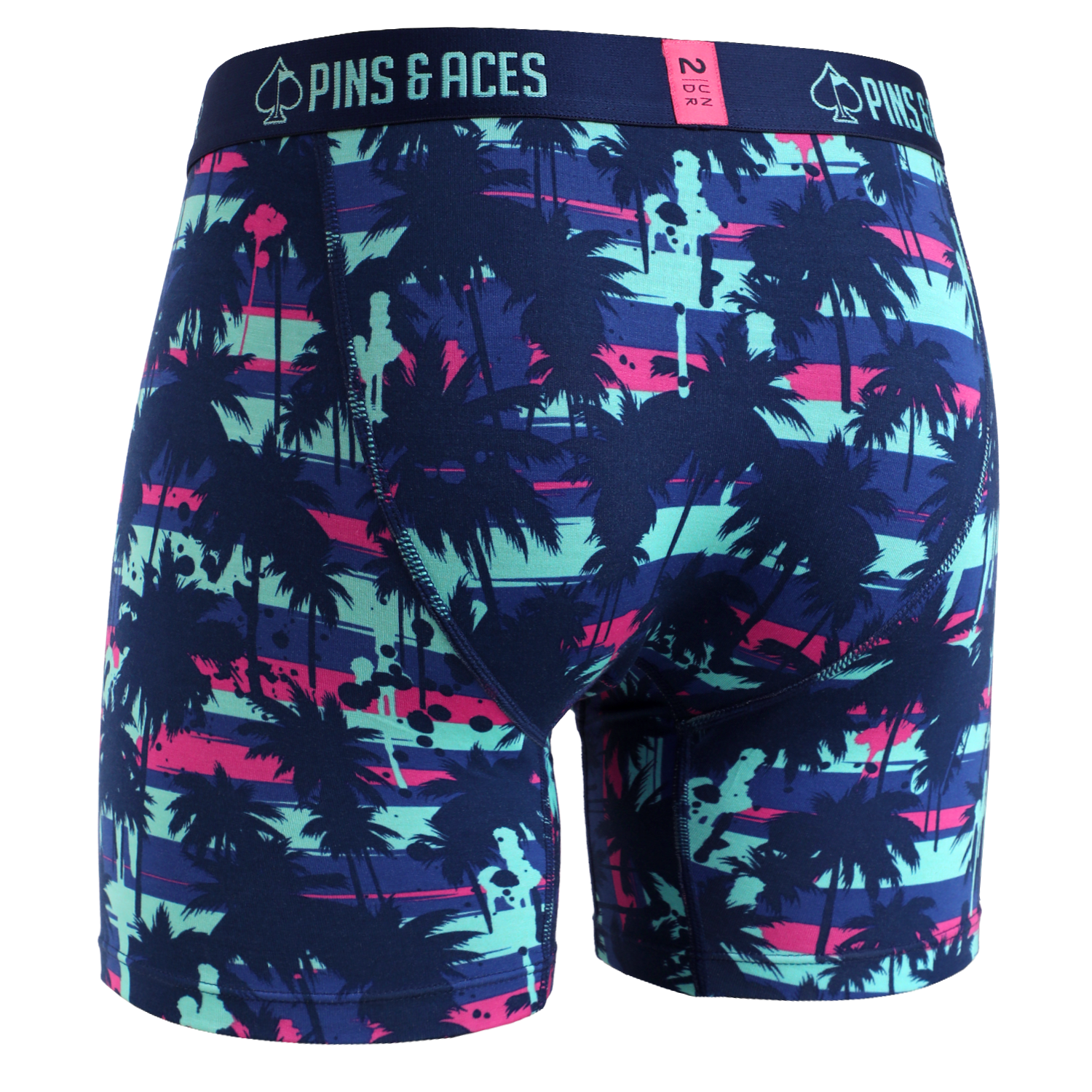 Bold 6-inch box briefs featuring a vibrant palm tree design in blue, pink, and green, ideal for stylish comfort on the golf course.