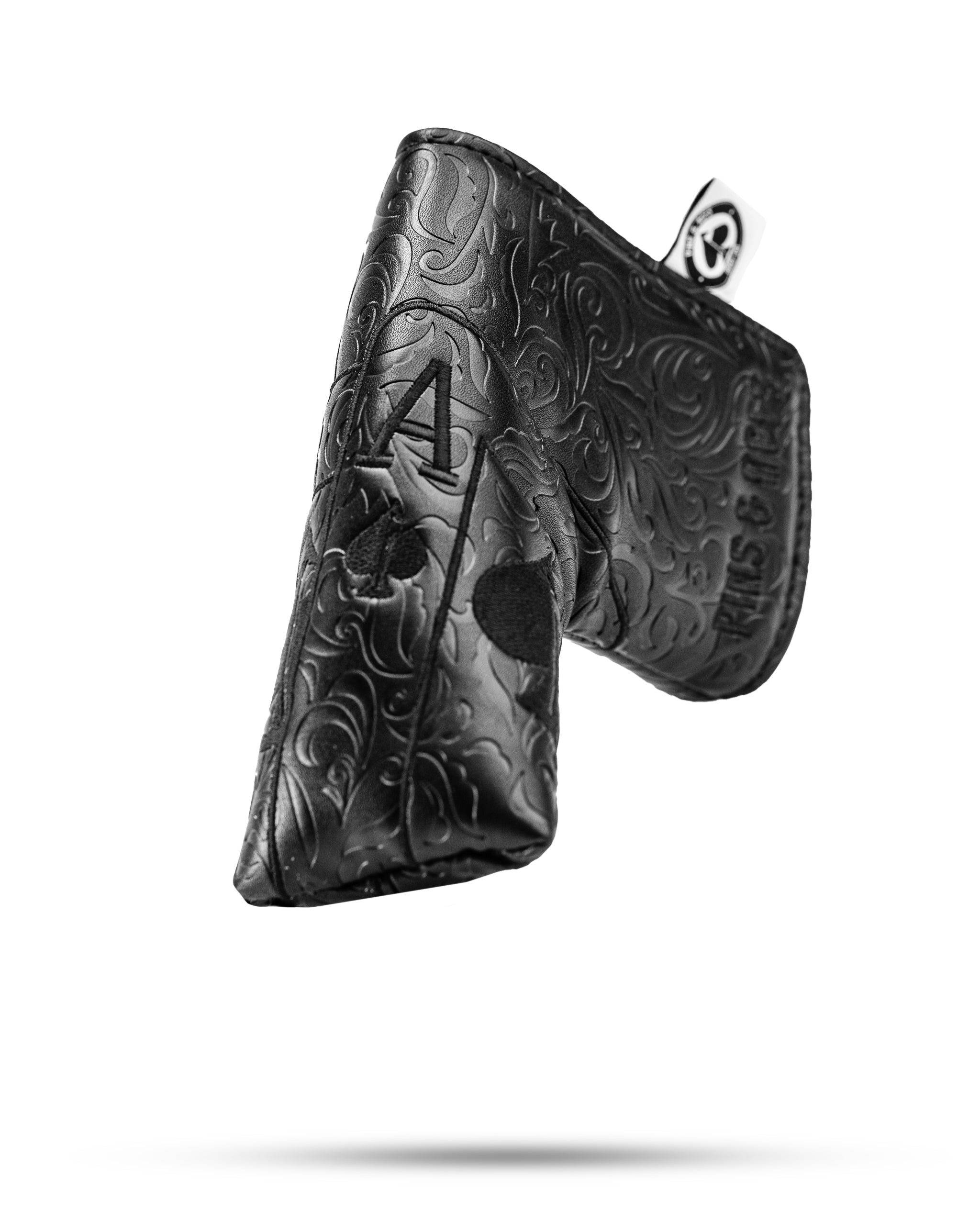 Blackout Ace of Spades blade putter cover featuring intricate embossed design in sleek black leather for stylish protection.