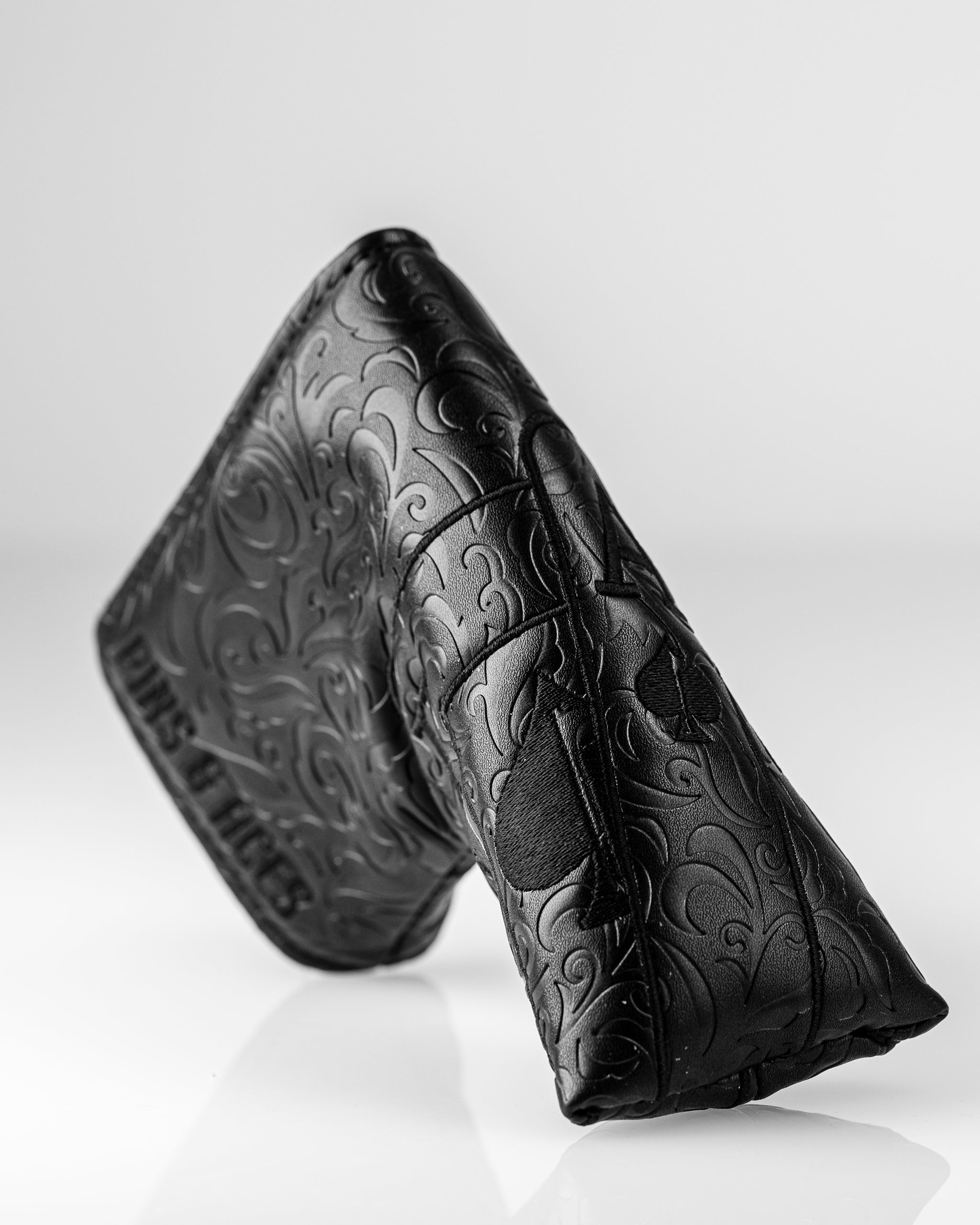 Blackout Ace of Spades blade putter cover featuring an embossed design, perfect for stylish golfers seeking unique accessories.