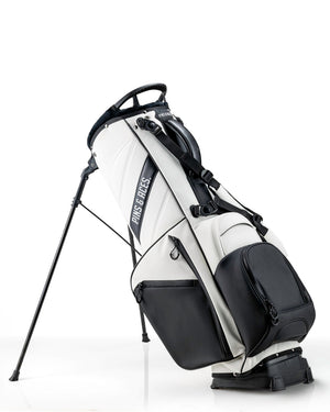 Stylish Player Preferred Golf Bag in white and black, featuring a sleek design and sturdy stand for golfers.