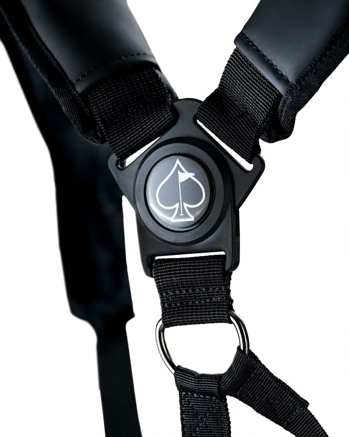 Close-up of the adjustable strap system on the Player Preferred Golf Bag in Obsidian, featuring a sleek spade logo.