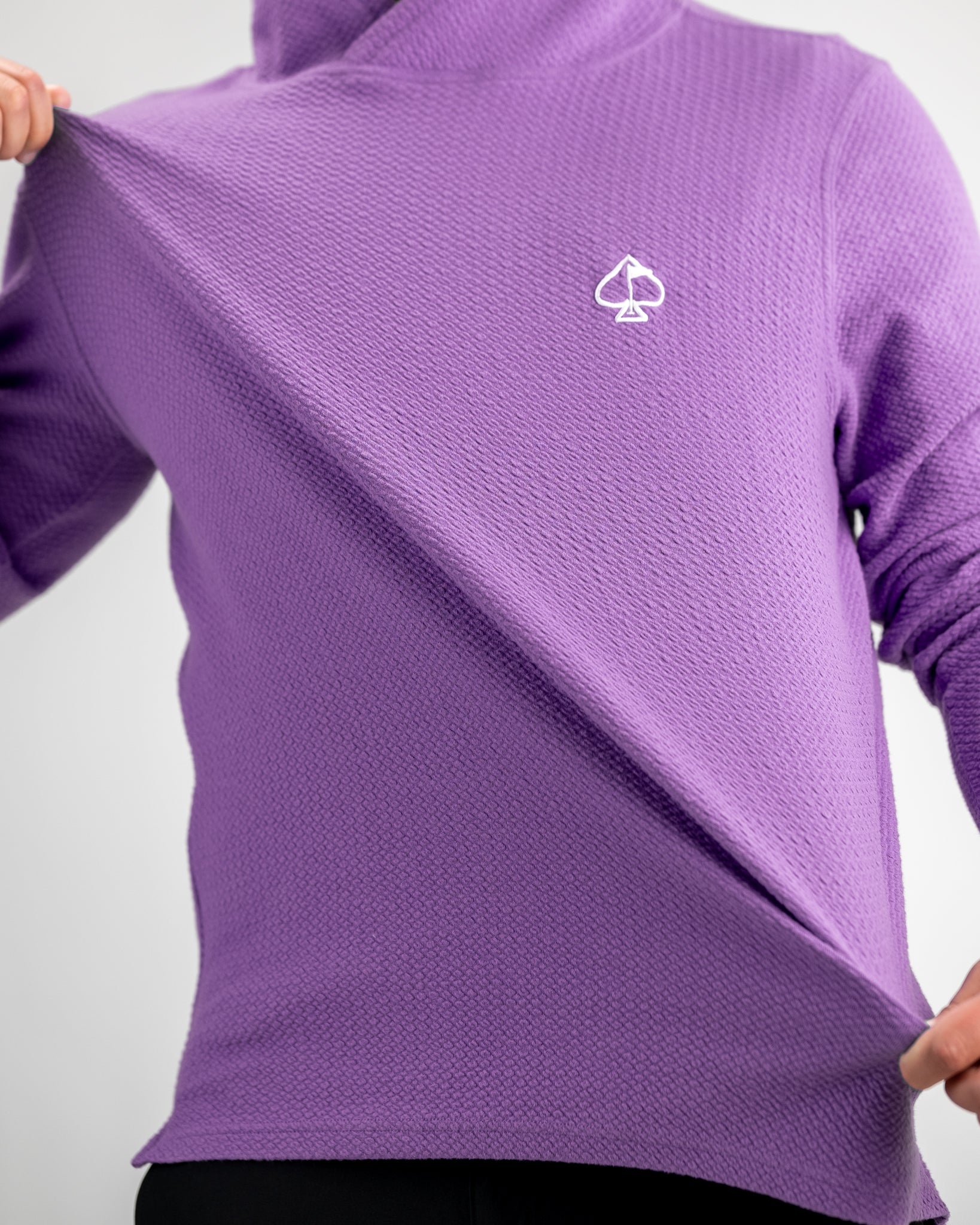 Player Preferred Waffle Knit Hoodie in grape color, featuring a textured design and a logo on the chest. Perfect for golfers.