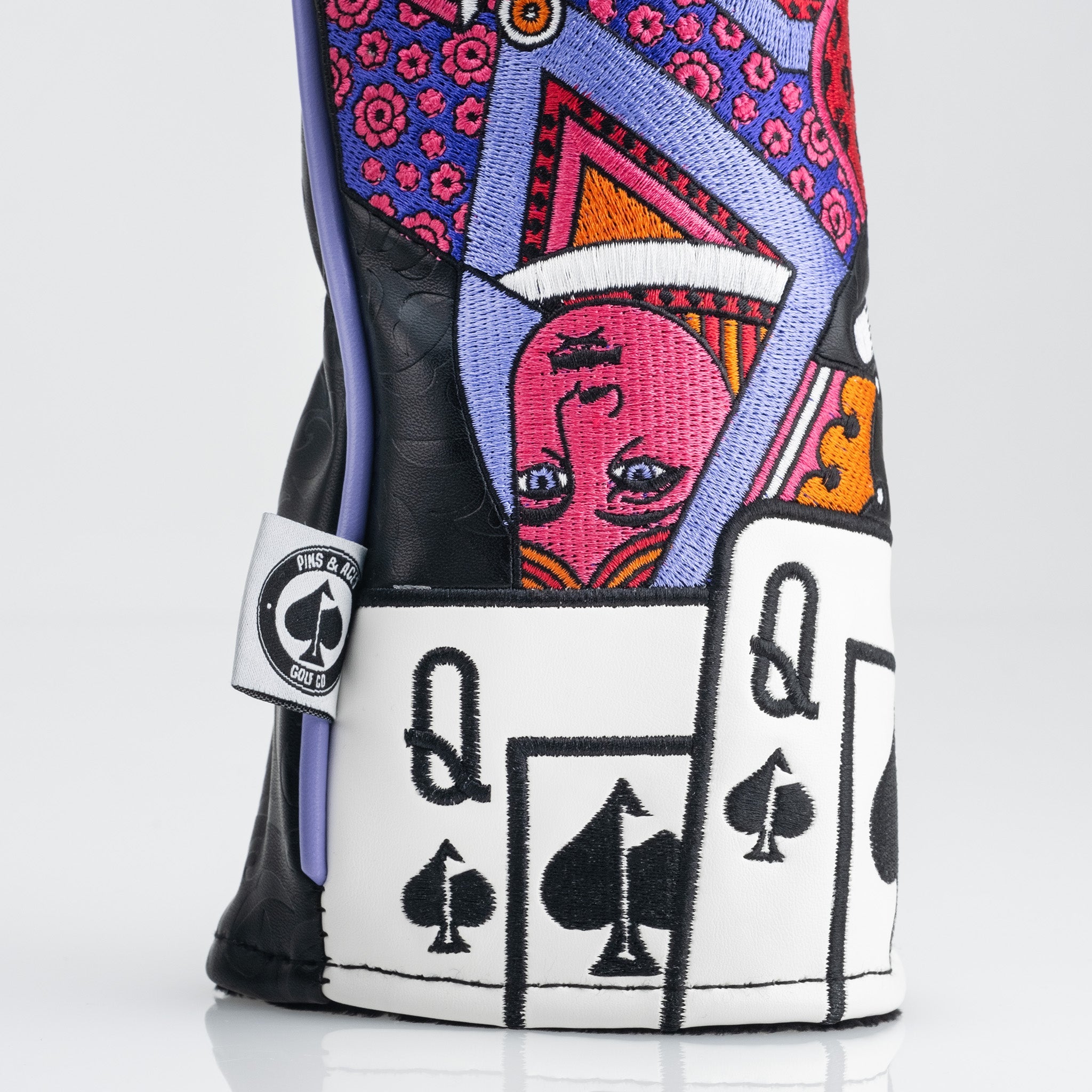 Colorful Queen of Spades fairway cover featuring intricate embroidery and a unique design for stylish golf protection.