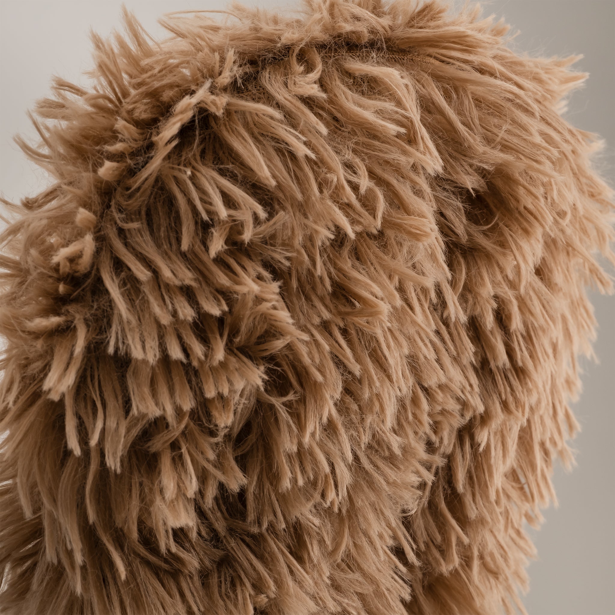 Sasquatch driver cover featuring a textured, shaggy design in a warm tan color, perfect for adding personality to golf gear.