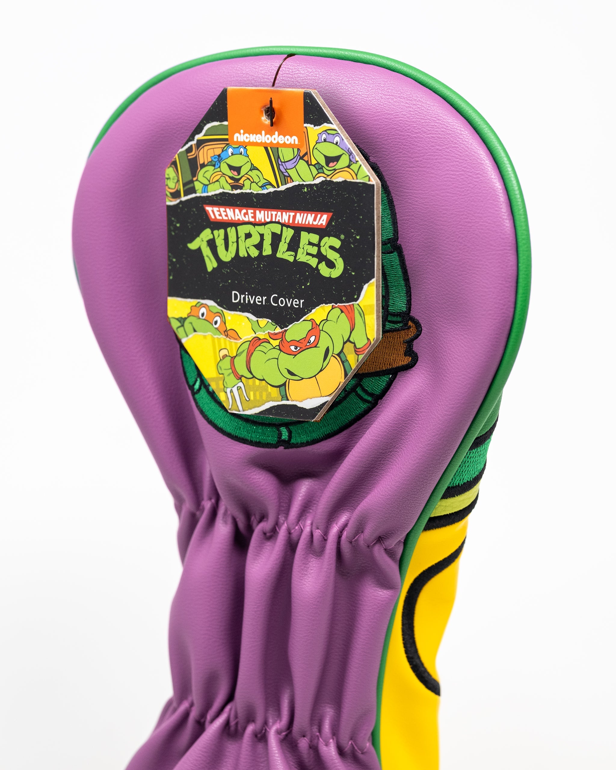 TMNT Donatello driver cover featuring vibrant purple and yellow design with a playful Teenage Mutant Ninja Turtles theme.