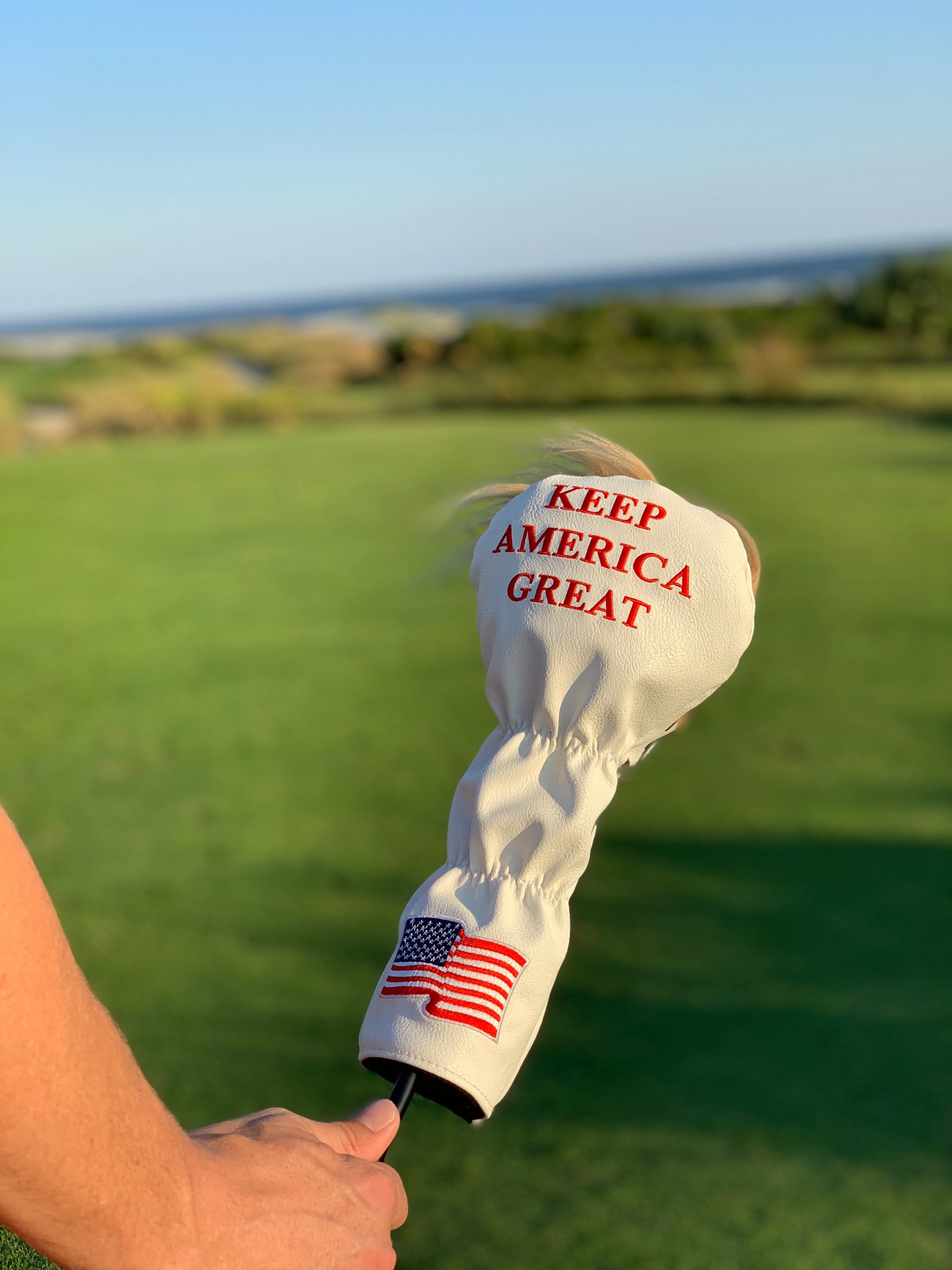 White golf fairway cover featuring "KEEP AMERICA GREAT" in red text and an American flag design.