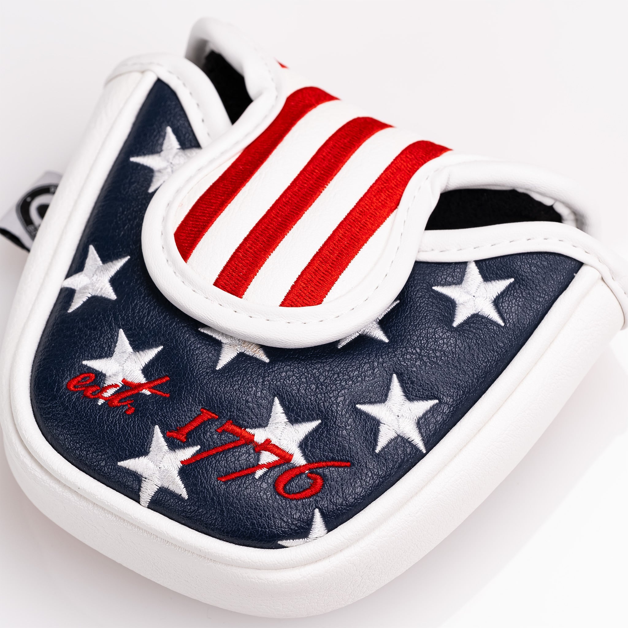 USA Tribute mallet putter cover featuring a patriotic design with stars and stripes in red, white, and blue.