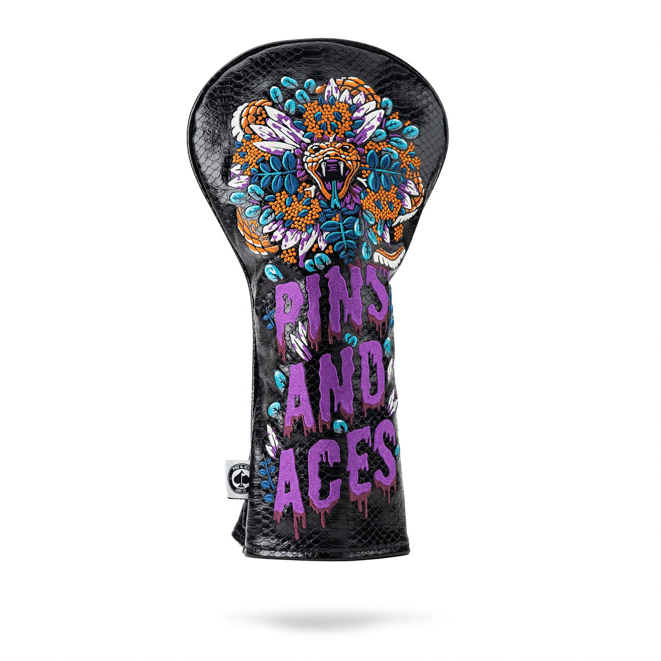 Bold Venom Driver Cover featuring a vibrant snake design and "Pins and Aces" text, perfect for standout golf style.