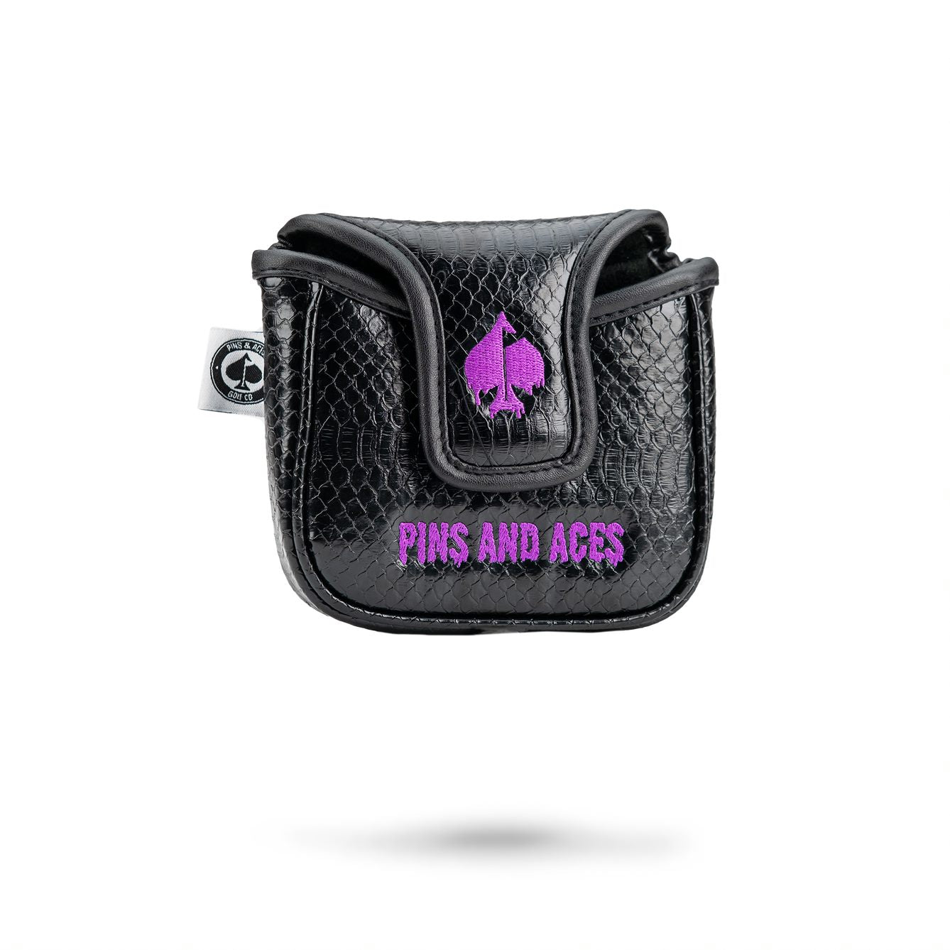 Black Venom mallet cover with a textured finish and bold purple lettering, designed for stylish golf protection.