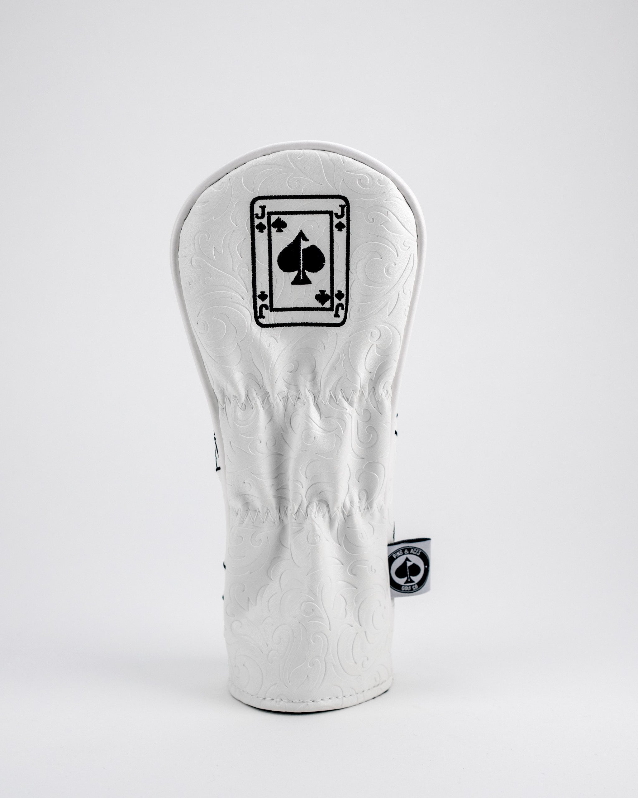 White Out Jack of Spades hybrid cover featuring an embossed design and a playing card motif, perfect for stylish golfers.