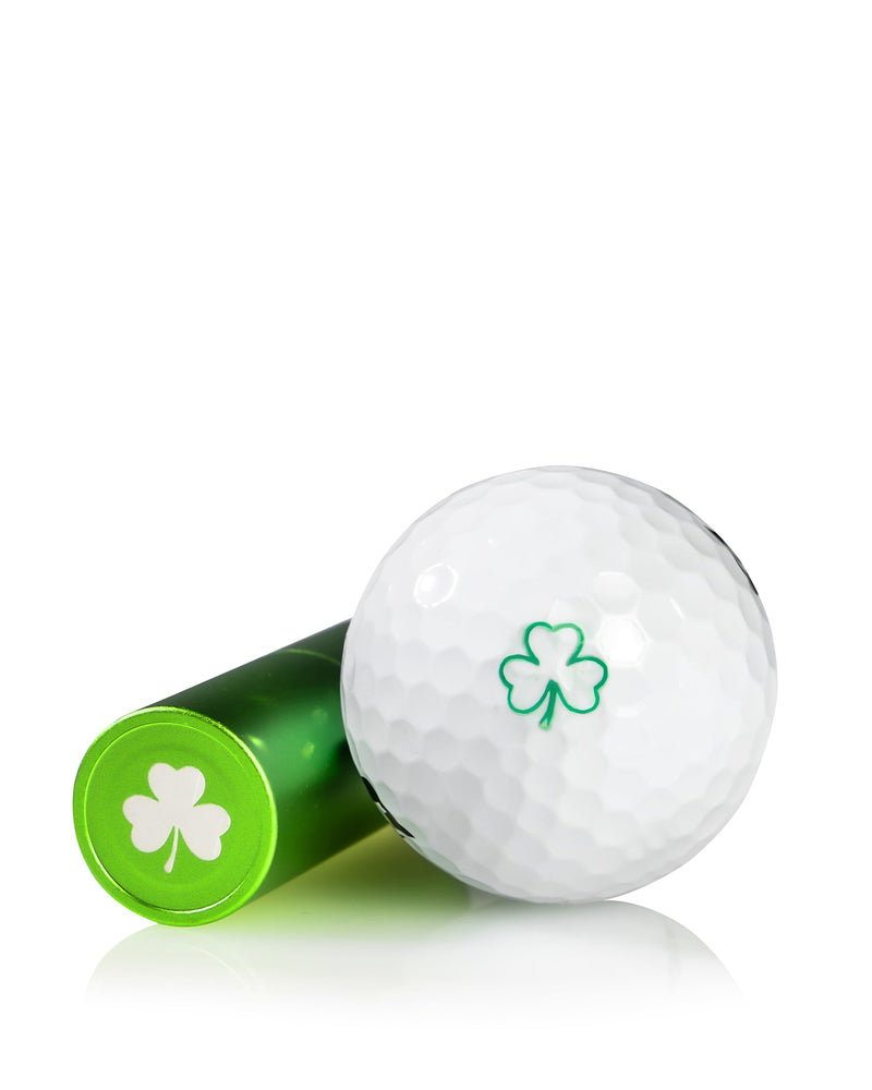 Clover ball stamp featuring a green clover design, next to a white golf ball, perfect for personalizing your golf gear.