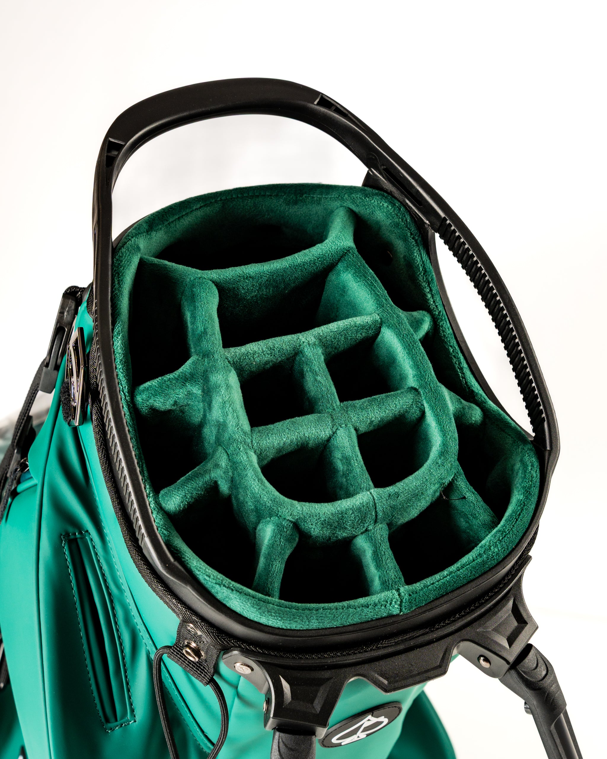 Interior view of the Player Preferred Golf Bag featuring a soft green lining and club dividers for organized storage.