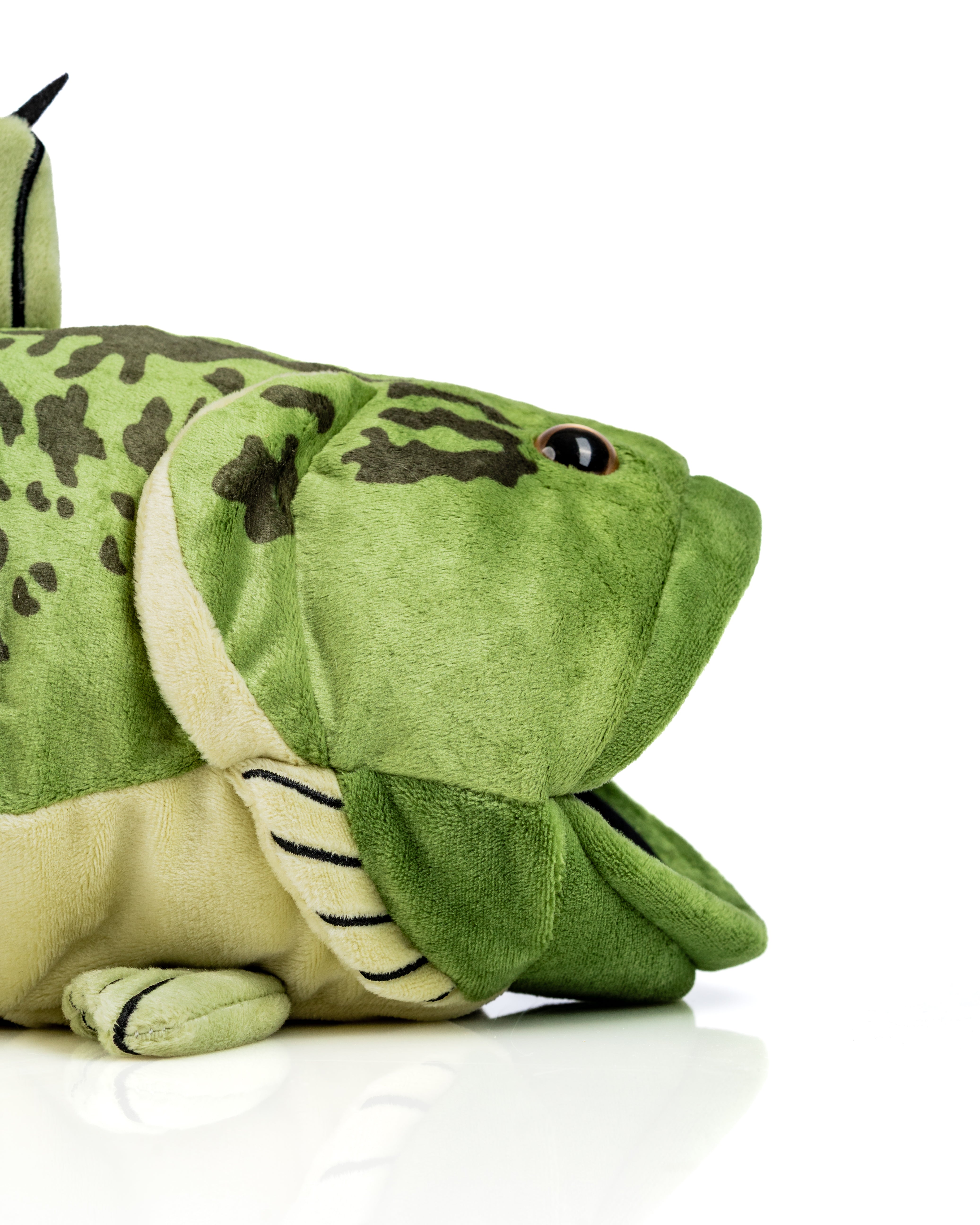 Plush bass driver cover designed for golfers, featuring realistic details and vibrant green colors for a fun, unique look.