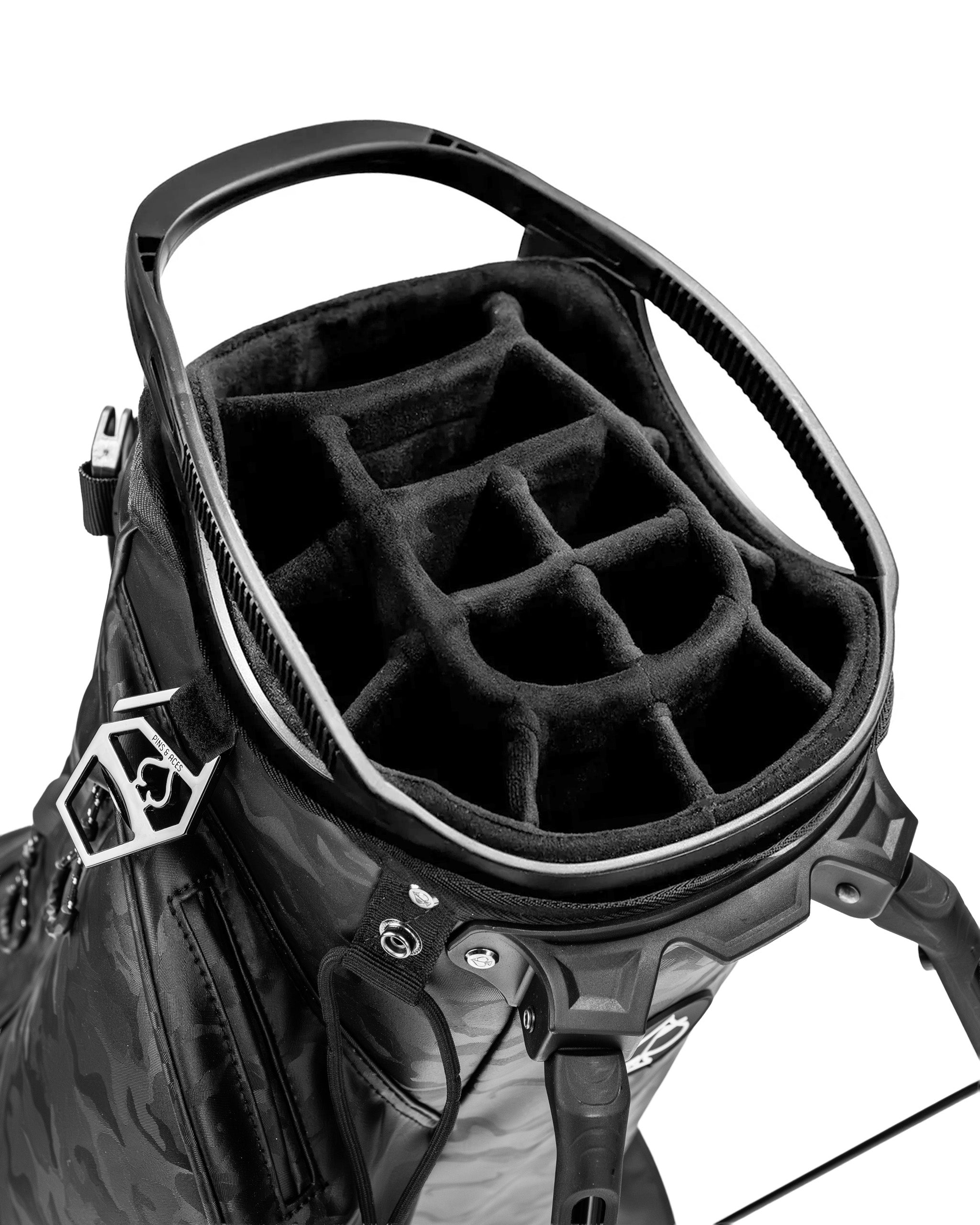 Top view of the Player Preferred Golf Bag in black camo, featuring a spacious, divided interior for club organization.
