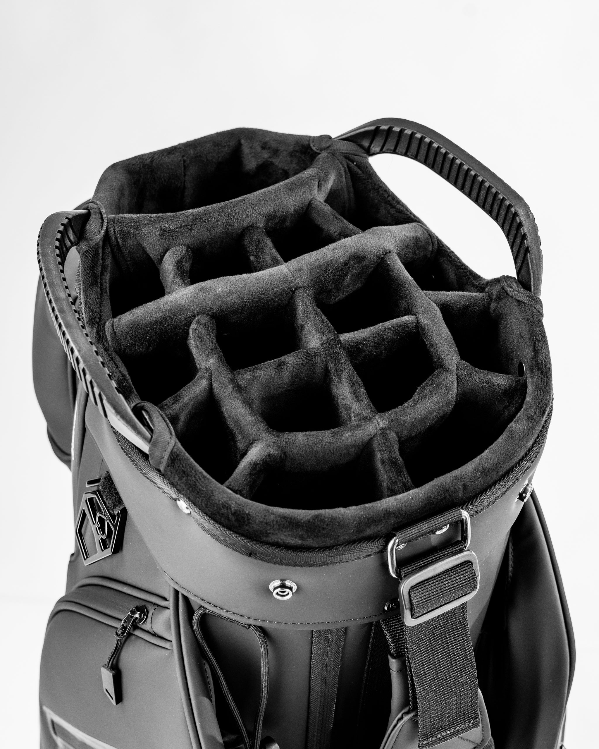 Top view of the Player Preferred Cart Bag in black, showcasing a spacious, organized interior with multiple dividers for clubs.
