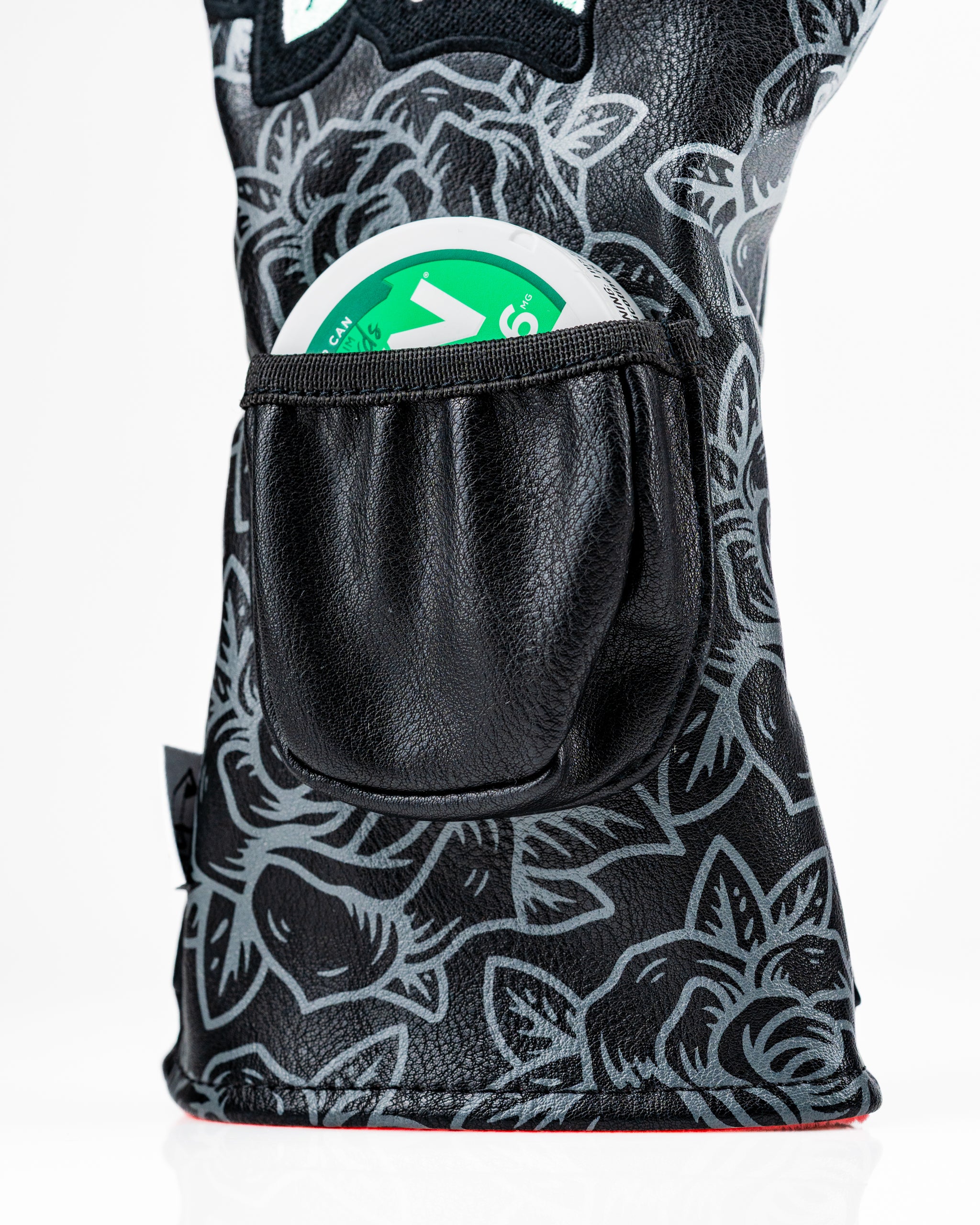 Bold floral driver cover featuring a pocket for accessories, designed for golfers who want to stand out on the course.