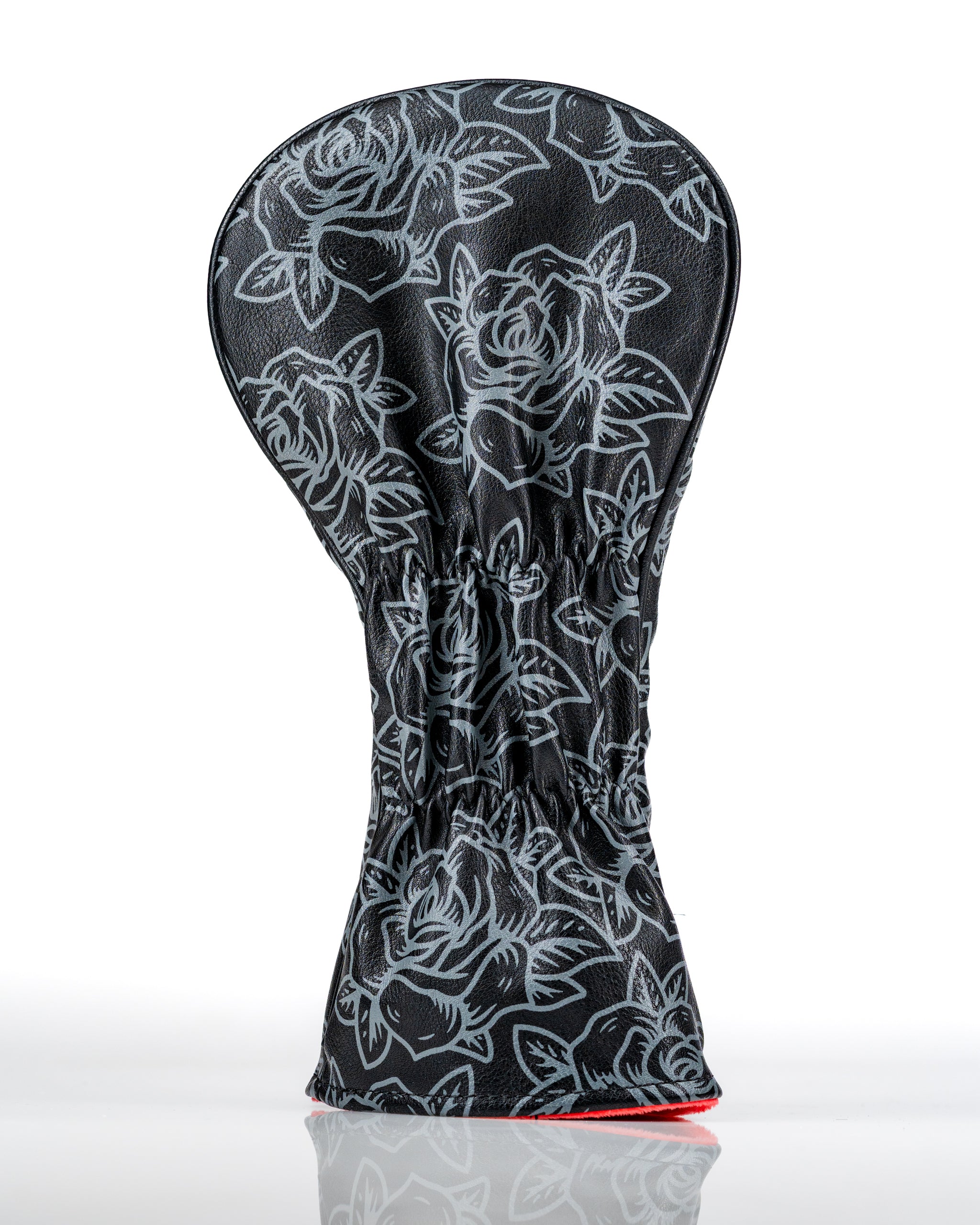 Stylish black driver cover featuring a rose pattern, designed for golfers seeking unique and bold accessories.