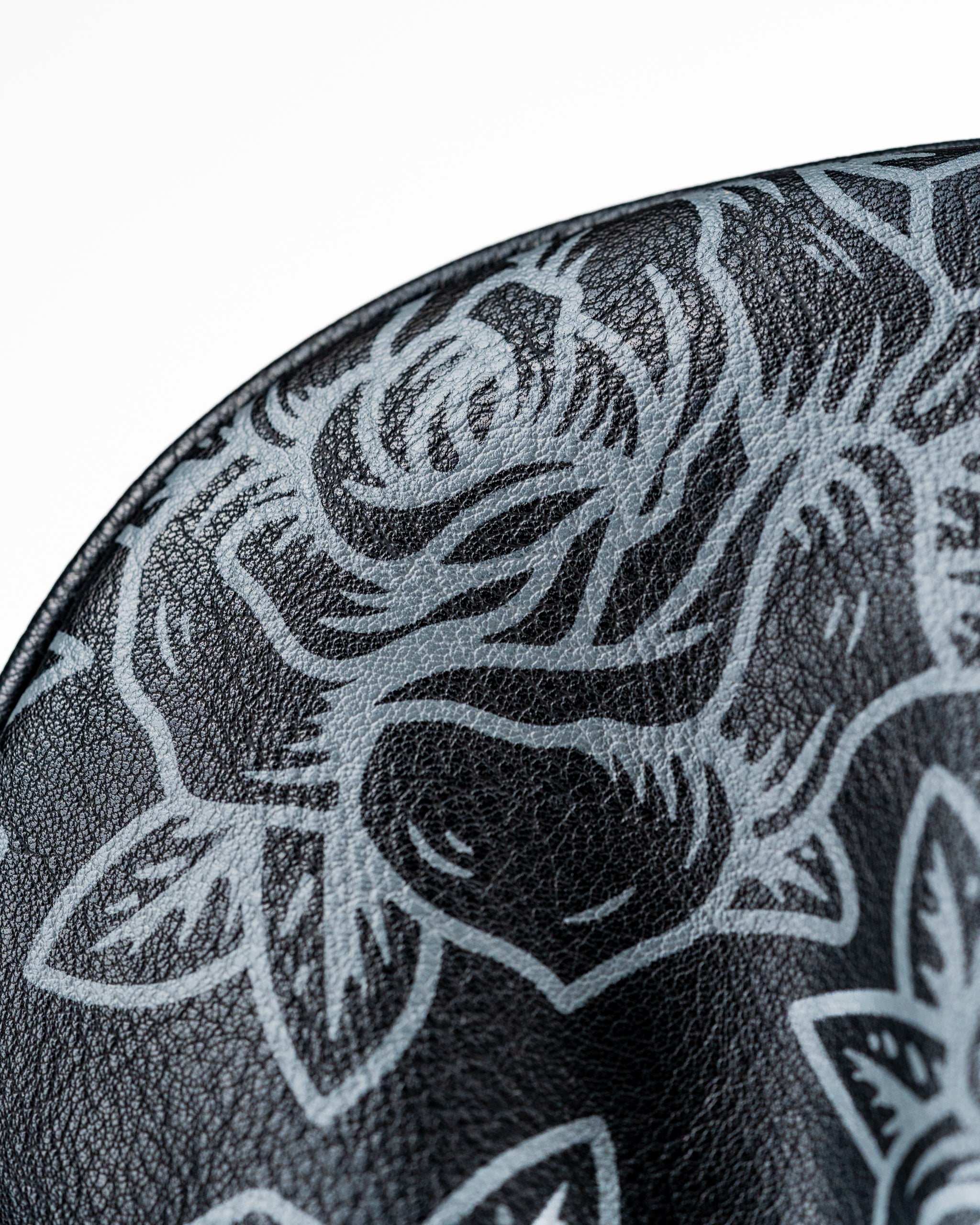 Stylish black driver cover featuring a bold floral design, perfect for golfers seeking unique accessories on the course.