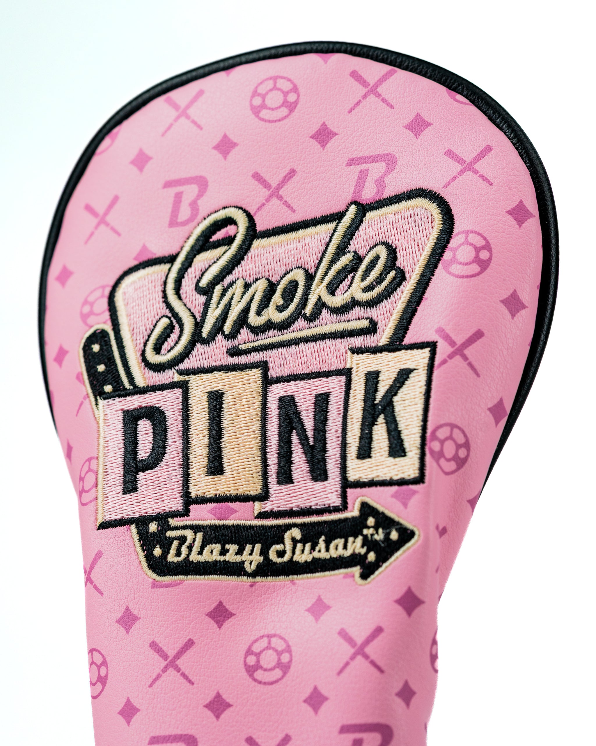 Bold pink hybrid golf cover featuring "Smoke Pink" design and Blazy Susan branding, perfect for stylish golfers.