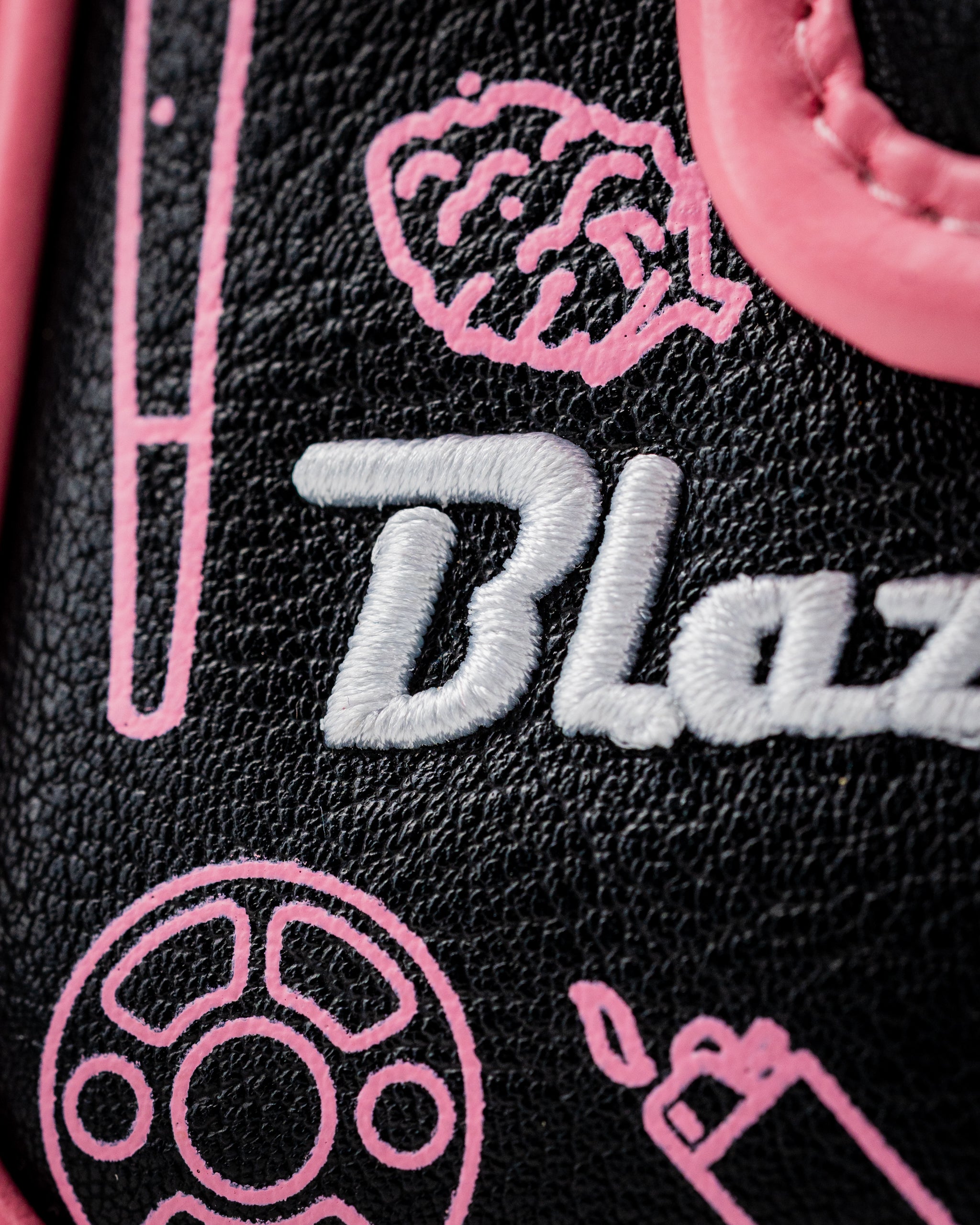 Mallet putter cover featuring a black and pink design with the Blazy Susan logo and playful graphics.