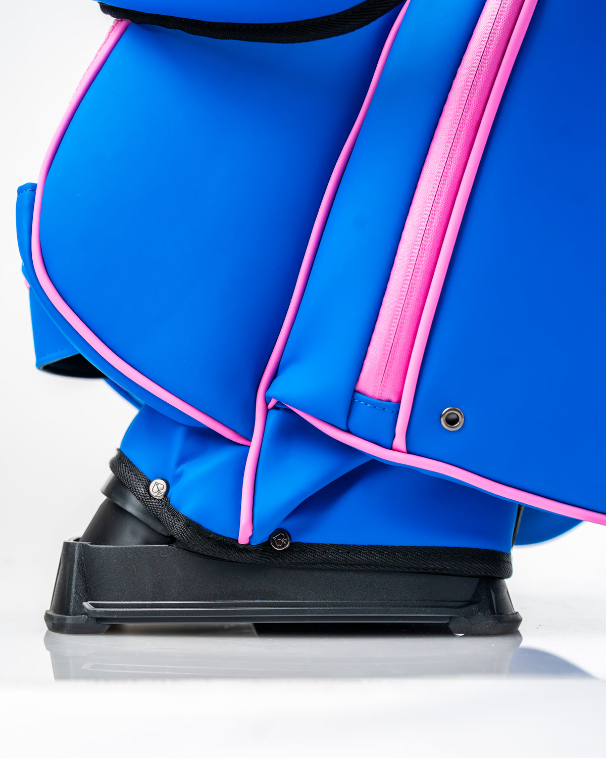 Close-up of the Player Preferred Golf Bag in blue raspberry, showcasing its vibrant color and sturdy base design.