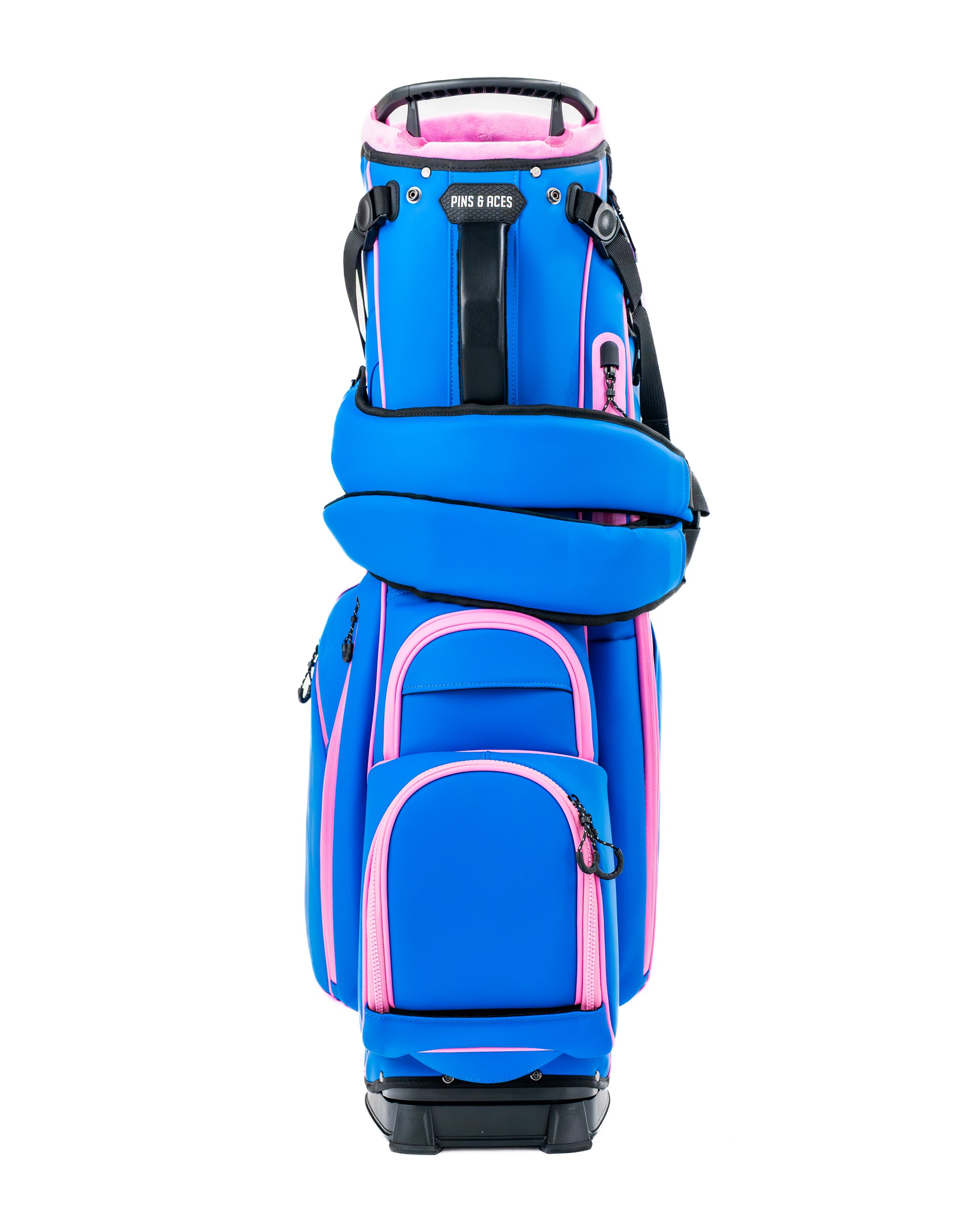 Bold blue raspberry golf bag with pink accents, featuring multiple pockets and a comfortable strap for easy carrying.