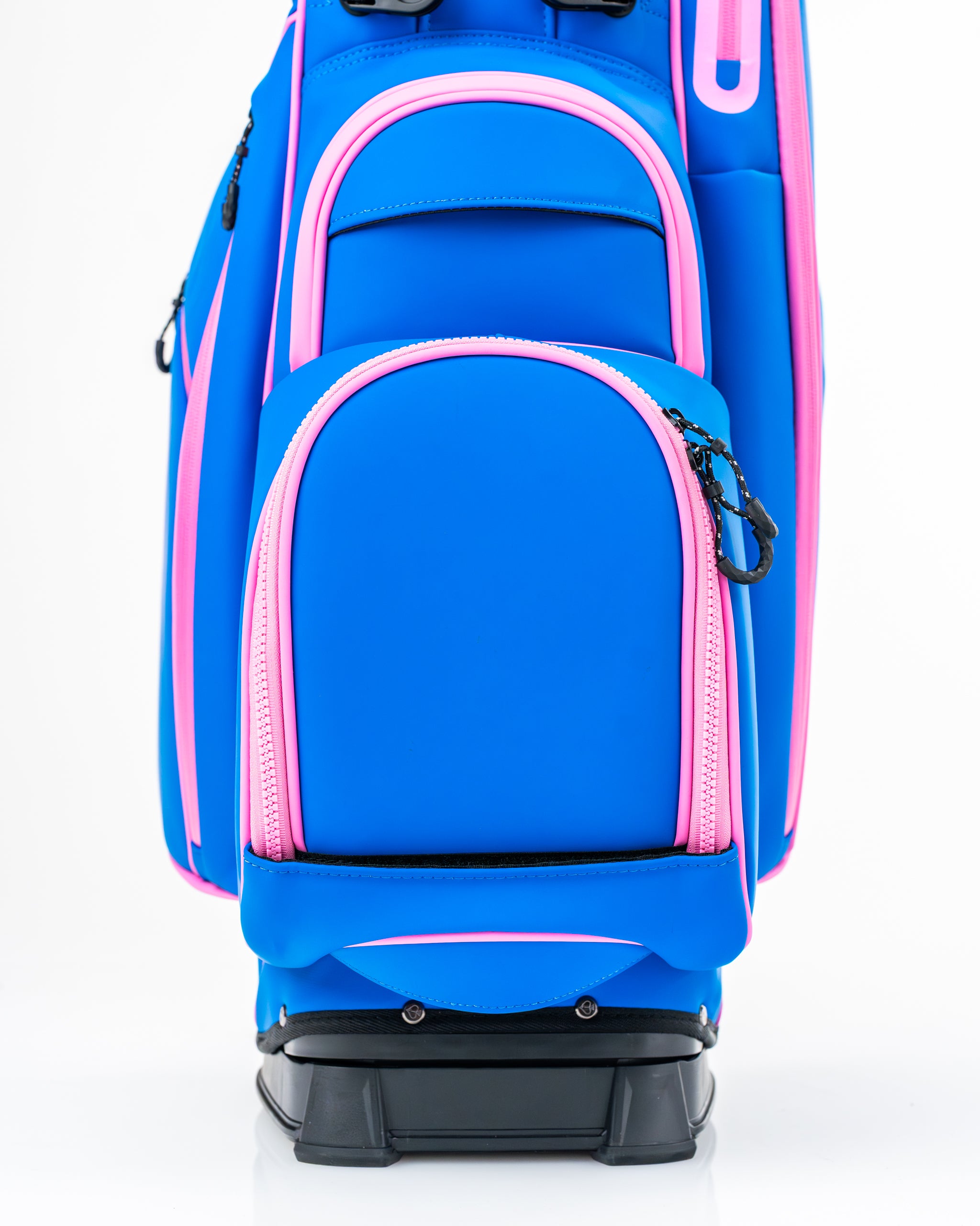 Bold blue raspberry golf bag with pink accents, featuring multiple zippered pockets for storage and a sleek design.