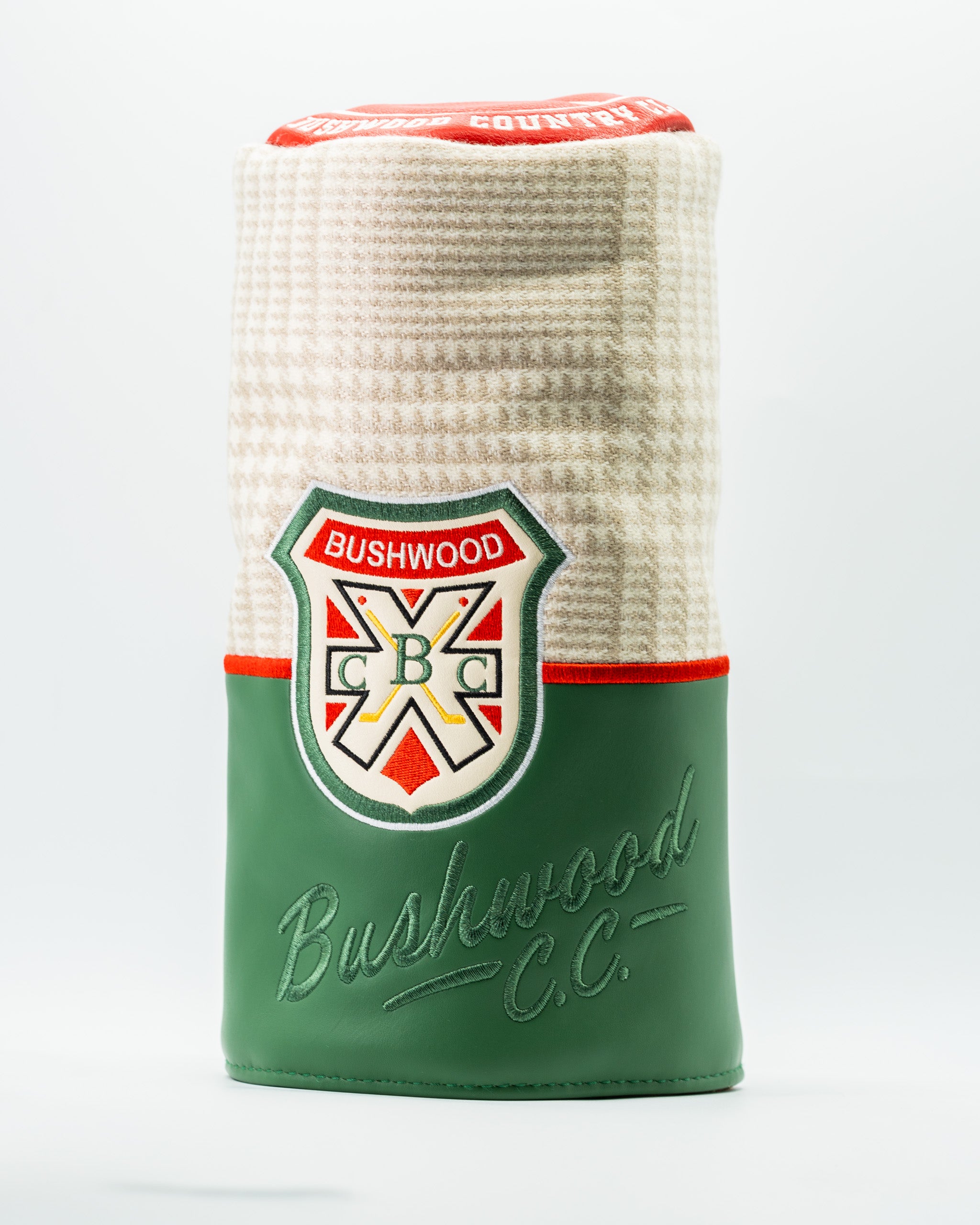 Bushwood CC driver cover featuring a classic design with a plaid pattern and embroidered logo, perfect for stylish golfers.