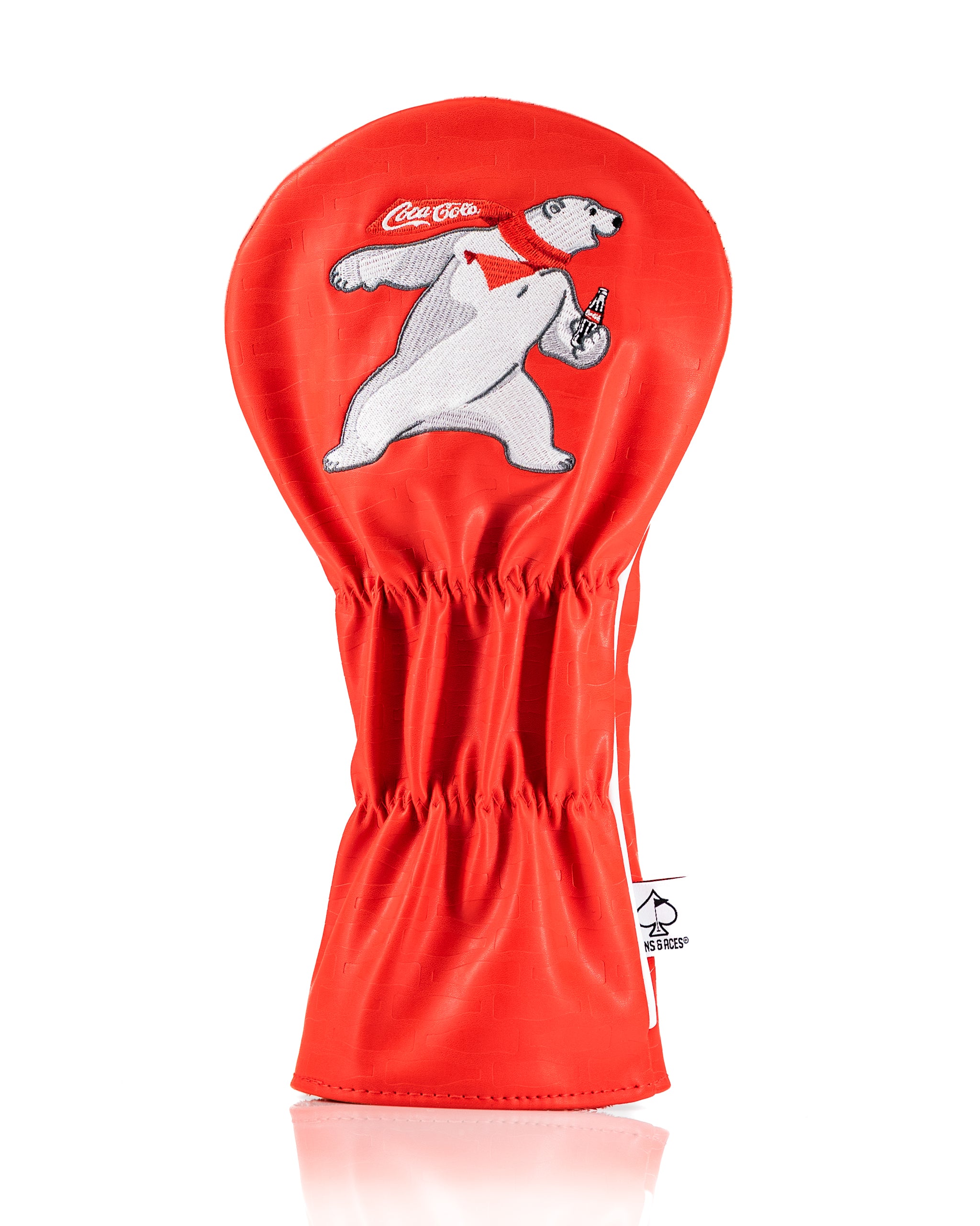 Coca-Cola driver cover featuring a playful polar bear design on a vibrant red background, perfect for golf enthusiasts.