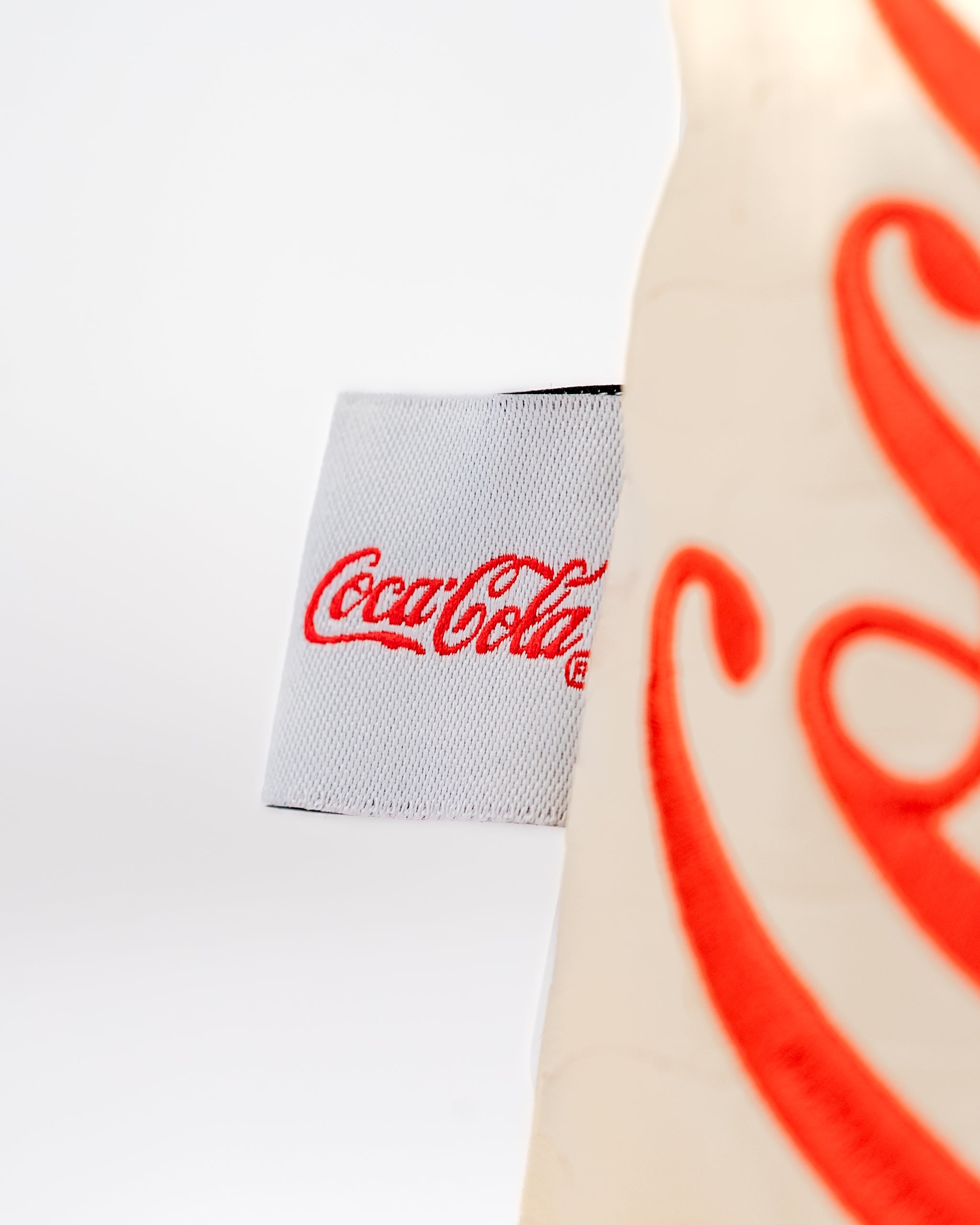 Coca-Cola hybrid golf headcover featuring a bold design and iconic logo for a standout look on the course.