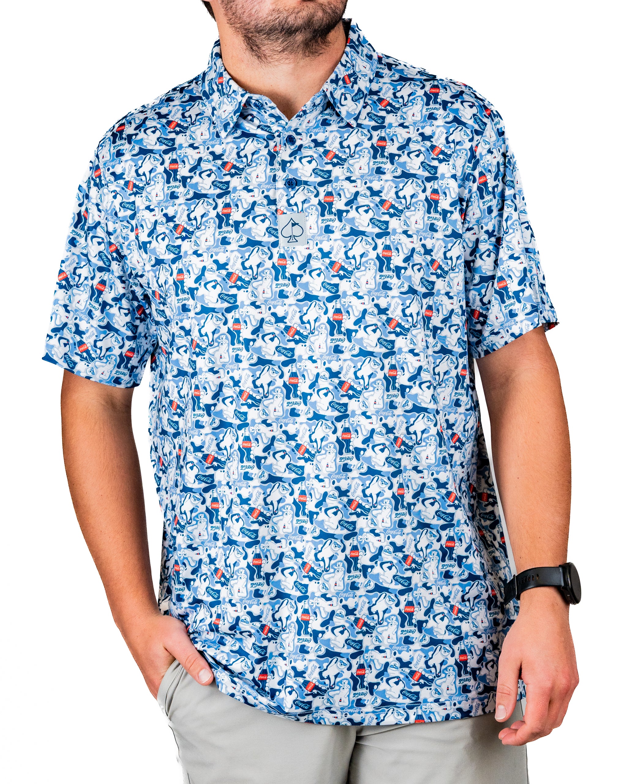 Men's short-sleeve shirt featuring a vibrant Coca-Cola-themed pattern with golf elements, perfect for stylish golfers.
